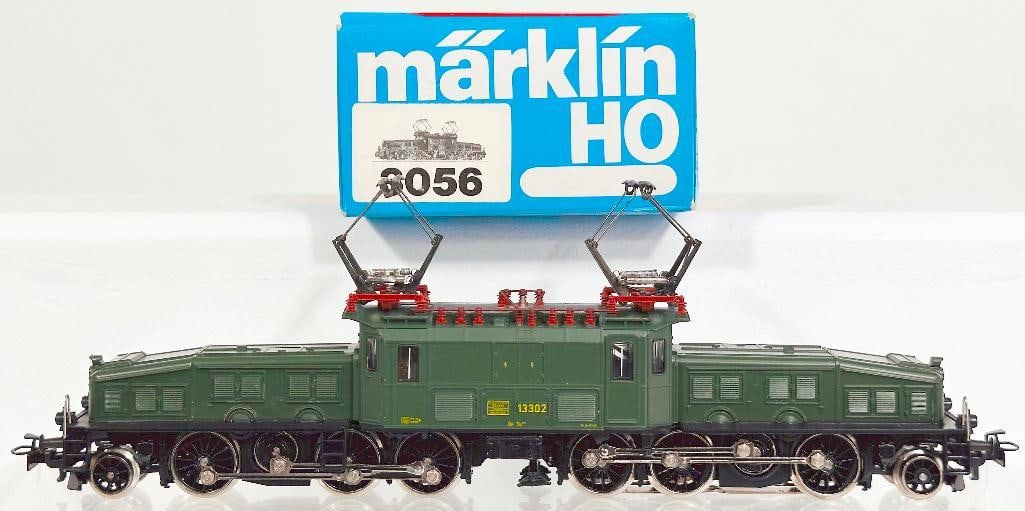 Marklin Postwar HO Scale #3056 SBB Crocodile Electric Locomotive Boxed: Marklin Postwar HO Scale #3056 SBB Crocodile Electric Locomotive Boxed, in C8 or better and with its original box - conventional and with plastic body. Longest item in this Lot is 13 inches.