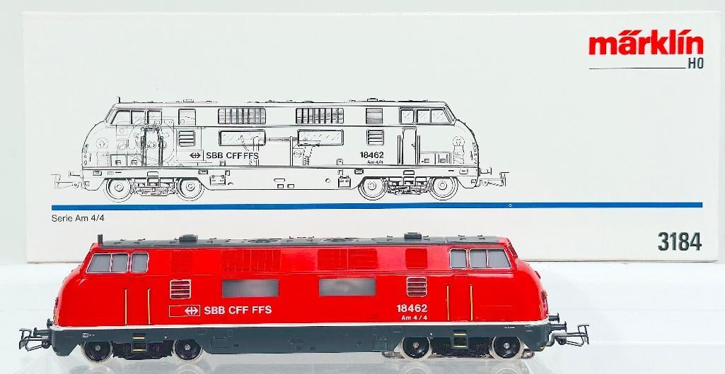Marklin Modern HO Scale #3184 SBB Serie Am 4/4 Diesel Locomotive Boxed: Marklin Modern HO Scale #3184 SBB Serie Am 4/4 Diesel Locomotive Boxed, in C8 or better and with its original box - conventional and with Five Star Propulsion. Longest item in this Lot is 13 inches.