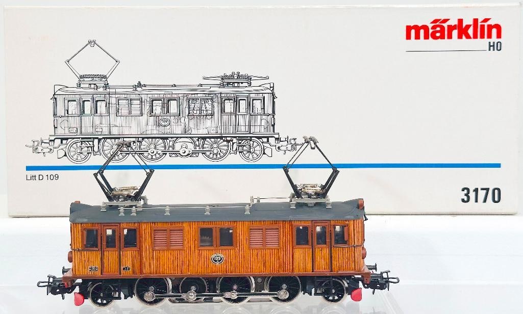 Marklin Modern HO Scale #3170 Litt D 109 Electric Locomotive Boxed: Marklin Modern HO Scale #3170 Litt D 109 Electric Locomotive Boxed, in C8 better with its original box - conventional and with plastic simulated wood body. Length is 11 inches.