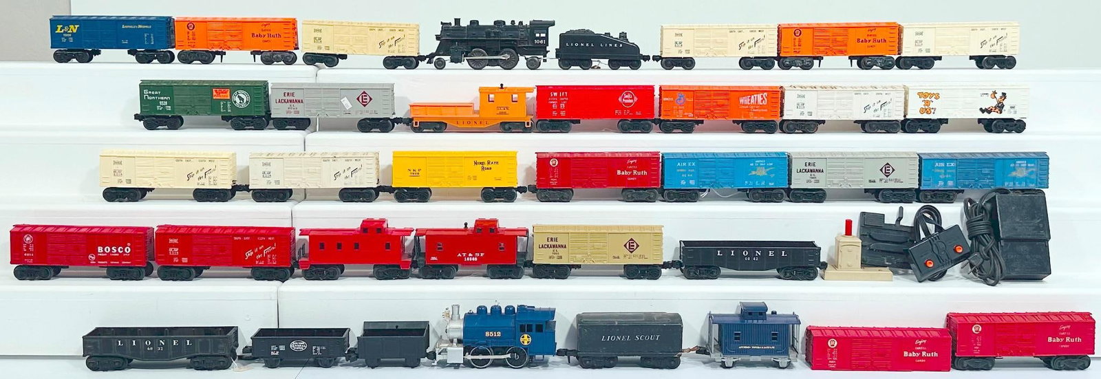 Lionel Postwar and Modern O Gauge Assorted Freight Cars and Gondolas: Lionel Postwar and Modern O Gauge Assorted Freight Cars and Gondolas, in C7 to C8. Due to the size and volume of this Lot, it will be costly to ship. There are no trains in this Lot. This is a
