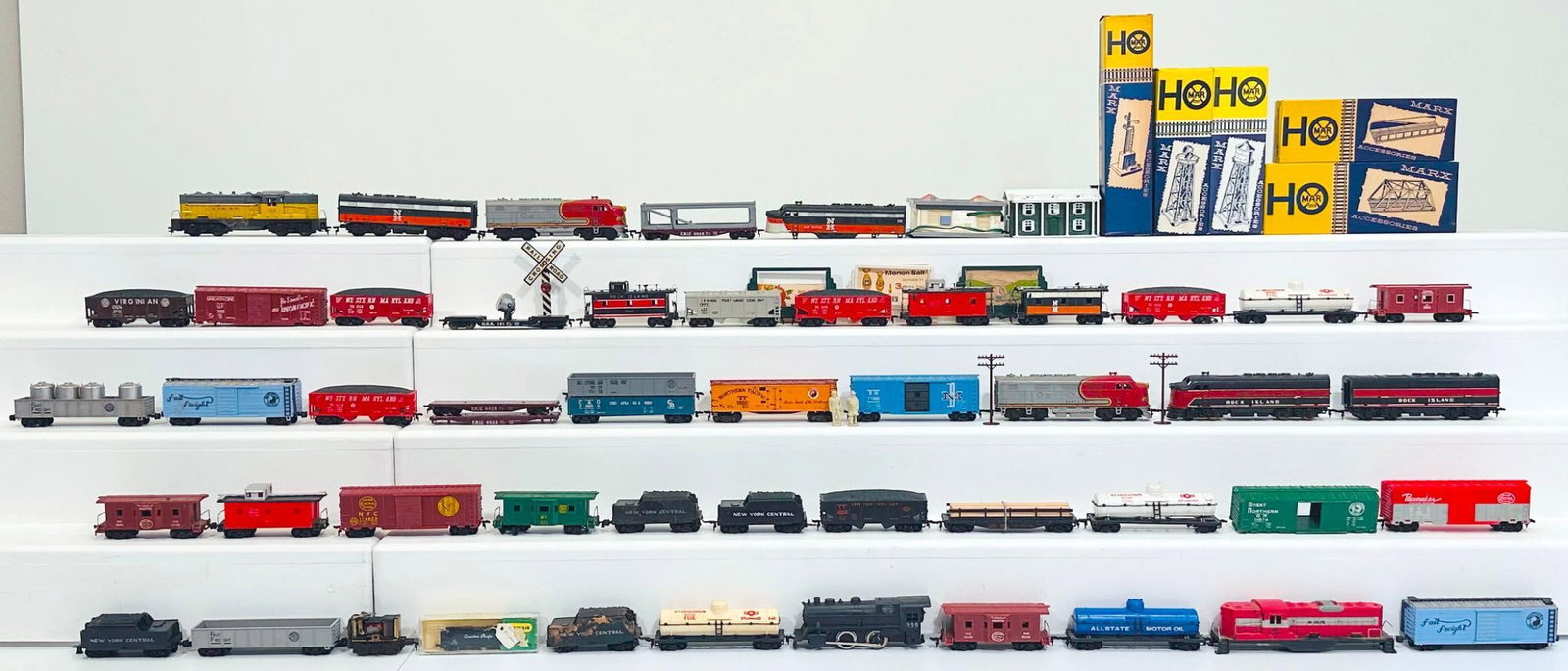 Marx Postwar HO Scale Assorted Freight Cars/Assorted Diesel Units/ Assorted Locomotives and Tenders: Marx Postwar HO Scale Assorted Freight Cars and Assorted Diesel Units and Assorted Locomotives and Tenders, in C7 to C8. Due to the size and volume of this Lot, it will be costly to ship. There are no