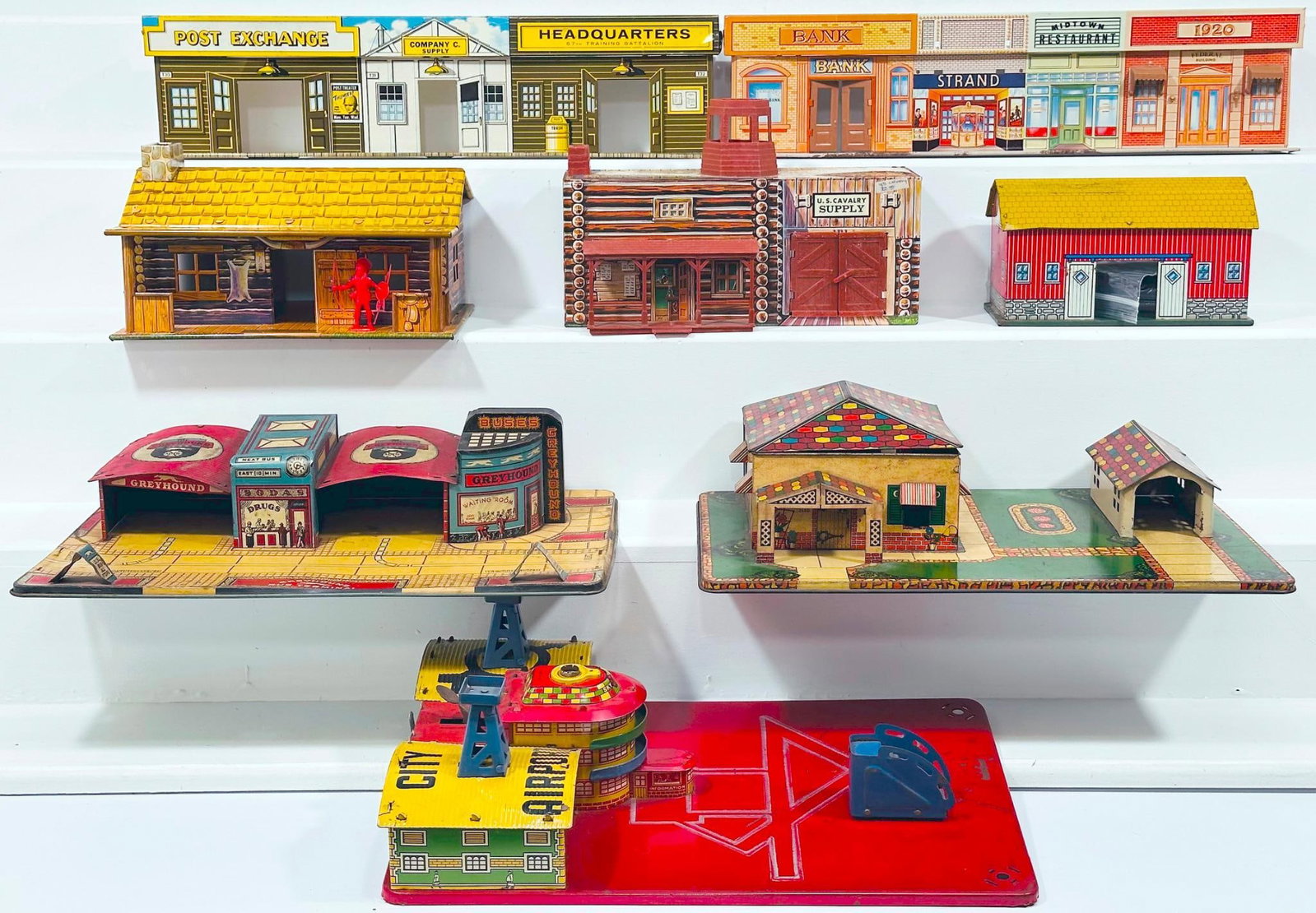 Marx Postwar Toys and Assorted Play Sets - City Airport - Greyhound Bus Station - Home: Marx Postwar Toys and Assorted Play Sets - City Airport - Greyhound Bus Station - Home, in C6 to C7. Due to the size and volume of this Lot, it will be costly to ship. There are no trains in this Lot.