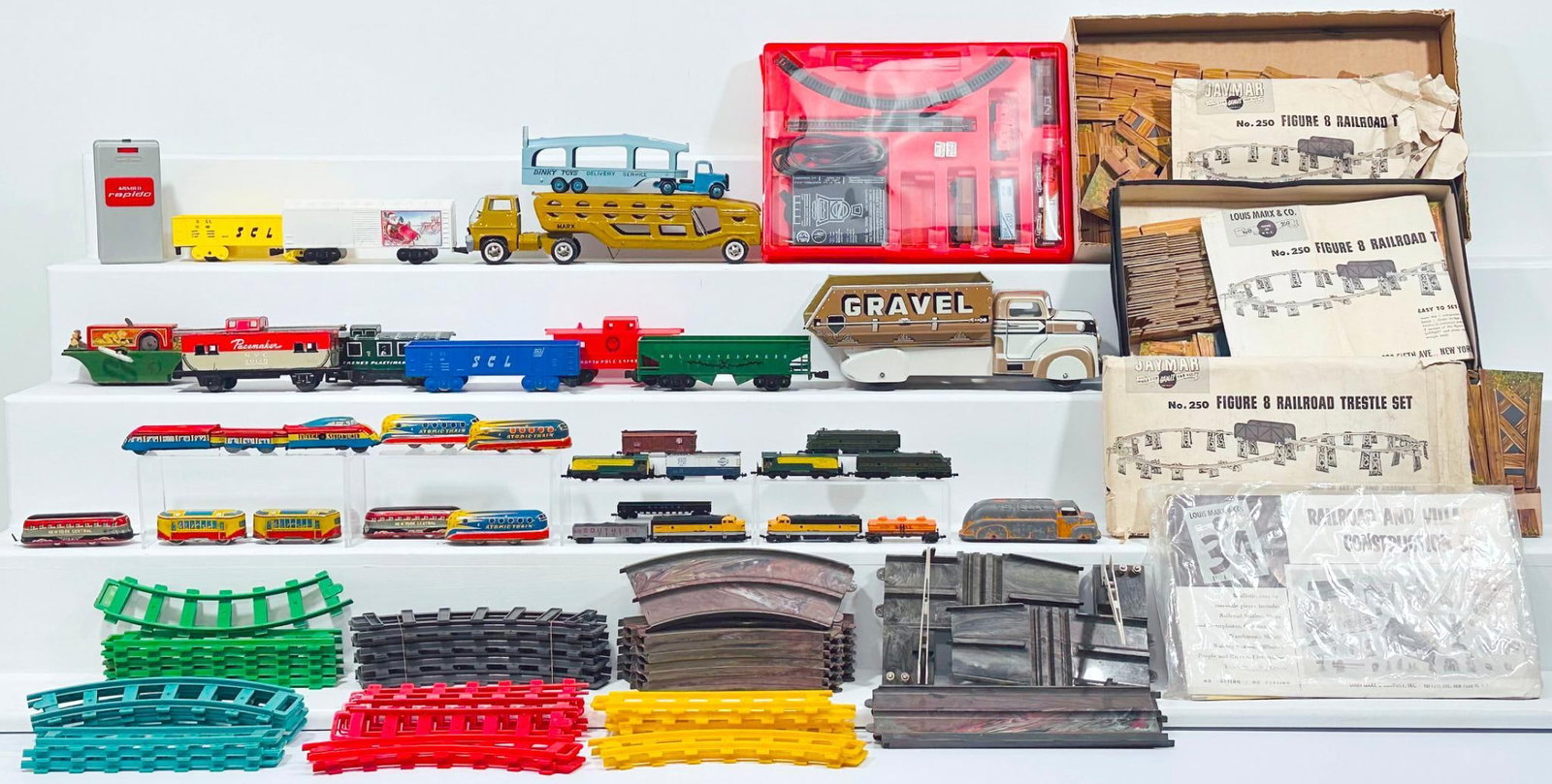 Marx Prewar and Postwar O Gauge and other Gauges Assorted Freight Cars/Passenger Cars and Tenders: Marx Prewar and Postwar O Gauge and other Gauges Assorted Freight Cars and Passenger Cars and Tenders, in C6 to C7. This is a General Condition Lot, meaning we have not graded or examined every item i