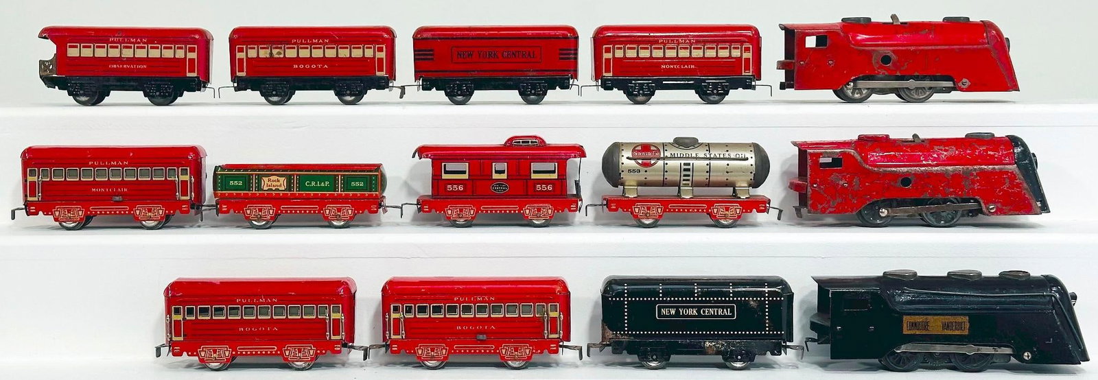 Marx Prewar O Gauge red Mercury Locomotive and Tender and Passenger Cars and Vanderbilt Locomotive: Marx Prewar O Gauge red Mercury Locomotive and Tender and Passenger Cars and Commodore Vanderbilt Locomotive and Tender and Two (2) red frame Freight Cars, in C5 for one of the red Mercury Locomotives