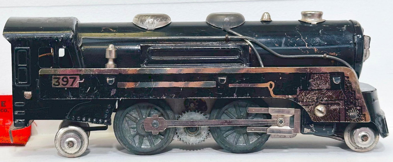 Marx Postwar O Gauge 397 black and silver trim Black Locomotive 0 - 4 - 0 Factory Archive: Marx Postwar O Gauge 397 black and silver trim Black Locomotive 0 - 4 - 0 Factory Archive, in C6. Very unusual silver hand painted trim on this Locomotive.
