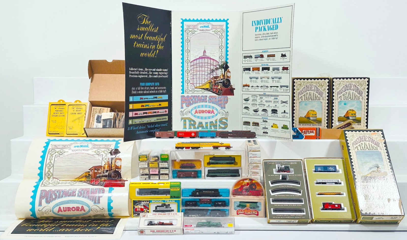 Atlas/Rapido/Minitrix/Brawa/HM Modern N Gauge Assorted Freight Cars and Passenger Cars: Atlas/Rapido/Minitrix/Brawa/HM Modern N Gauge Assorted Freight Cars and Passenger Cars, each in C8 and each with its original box or plastic container.