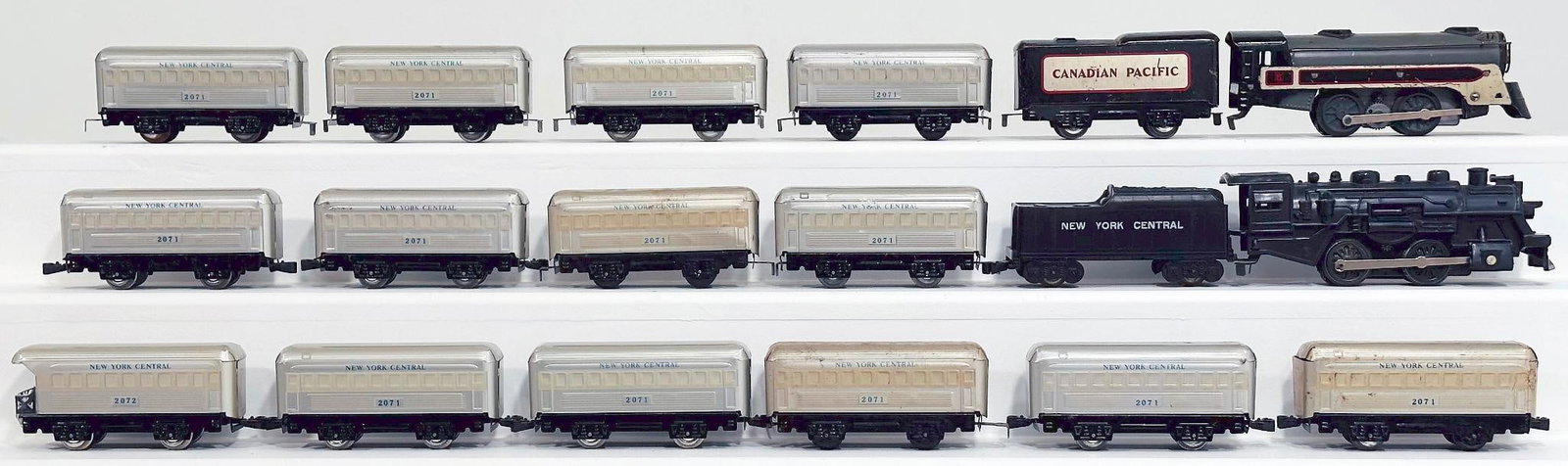 Marx Prewar and Postwar Canadian Pacific Locomotive and Tender with Four (4) NYC Passenger Cars: Marx Prewar and Postwar Canadian Pacific Locomotive and Tender with Four (4) New York Central Passenger Cars/black plastic Locomotive and New York Central Tender with Four (4) New York Central Passeng