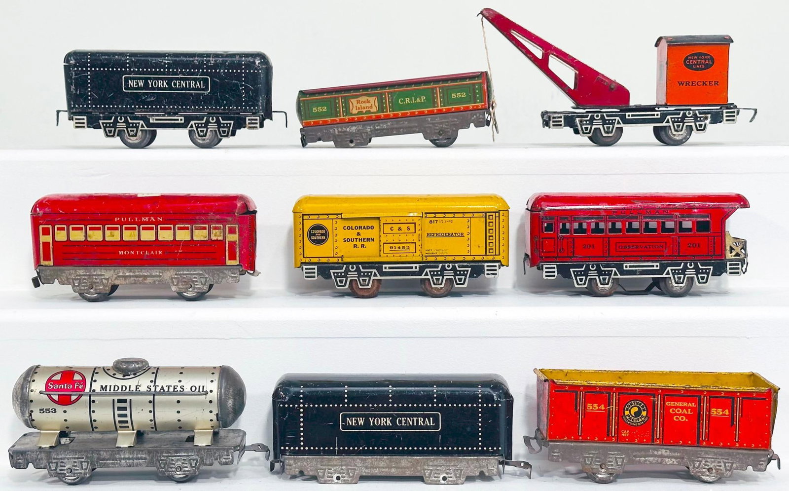 Marx Prewar and Postwar O Gauge Two (2) Assorted Tenders-Five (5) Assorted Freight Cars-Two (2) Cars: Marx Prewar and Postwar O Gauge Two (2) Assorted Tenders- Five (5) Assorted Freight Cars - Two (2) Assorted Passenger Cars, each in C6 or better. The 552 Gondola is missing one wheel set and the New