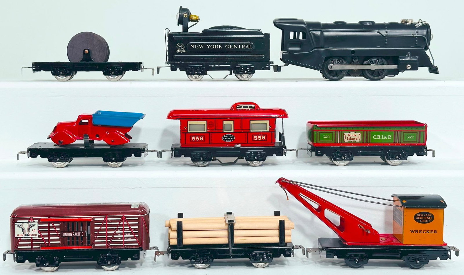 Marx Postwar O Gauge 0 4-0 Locomotive and New York Central Tender with Seven (7) Assorted Freights: Marx Postwar O Gauge 0 - 4 - 0 Locomotive and New York Central Tender with Seven (7) Assorted Freight Cars, each in C7 minus to C7.