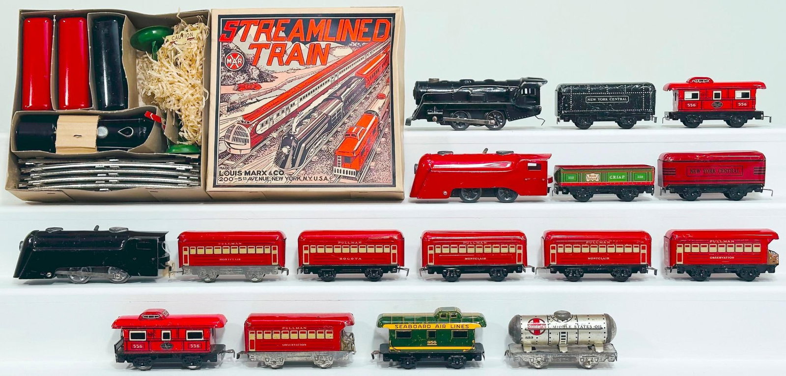 Marx Prewar and Postwar O Gauge Black 0 - 4 - 0 New York Central Locomotive and Tender: Marx Prewar and Postwar O Gauge Black 0 - 4 - 0 New York Central Locomotive and Tender and red 0 - 4 - 0 Locomotive and Tender and Five (5) Freight Cars/black 0 - 4 - 0 Black Locomotive and Five (5)
