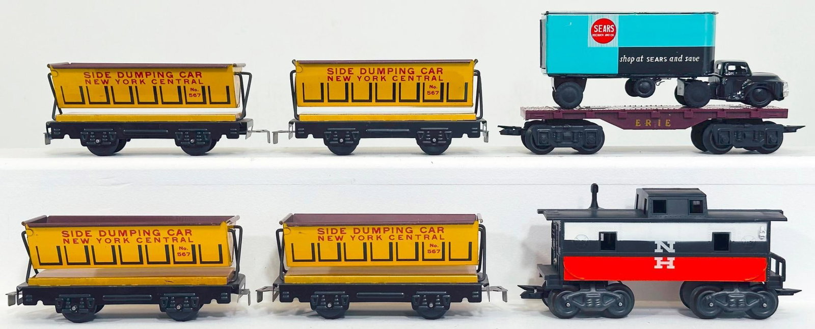 Marx Postwar O Gauge New York Central Side Dumping Car X4 and New Haven Caboose and Erie Flat Car (1 of 6)