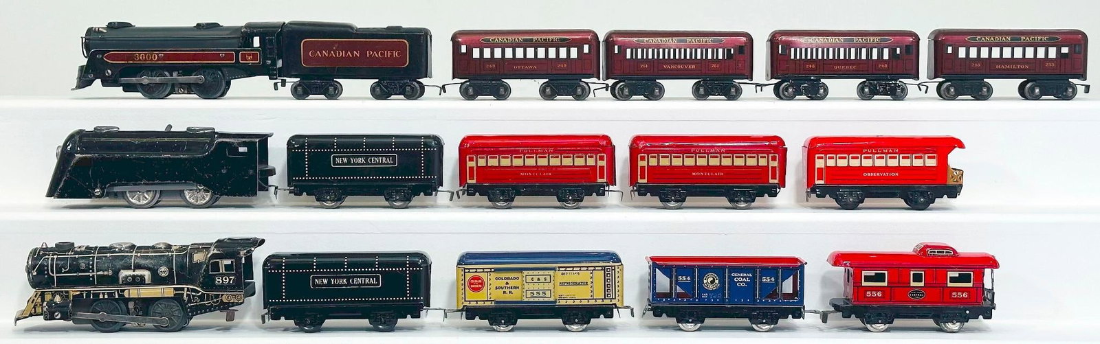 Marx Prewar and Postwar O Gauge Assorted Locomotives and Tenders: Marx Prewar and Postwar O Gauge Canadian Pacific Locomotive and Tender and Four (4) Canadian Pacific Passenger Cars/black Locomotive 0 - 4 - 0 and New York Central Tender and Three (3) red Passenger C