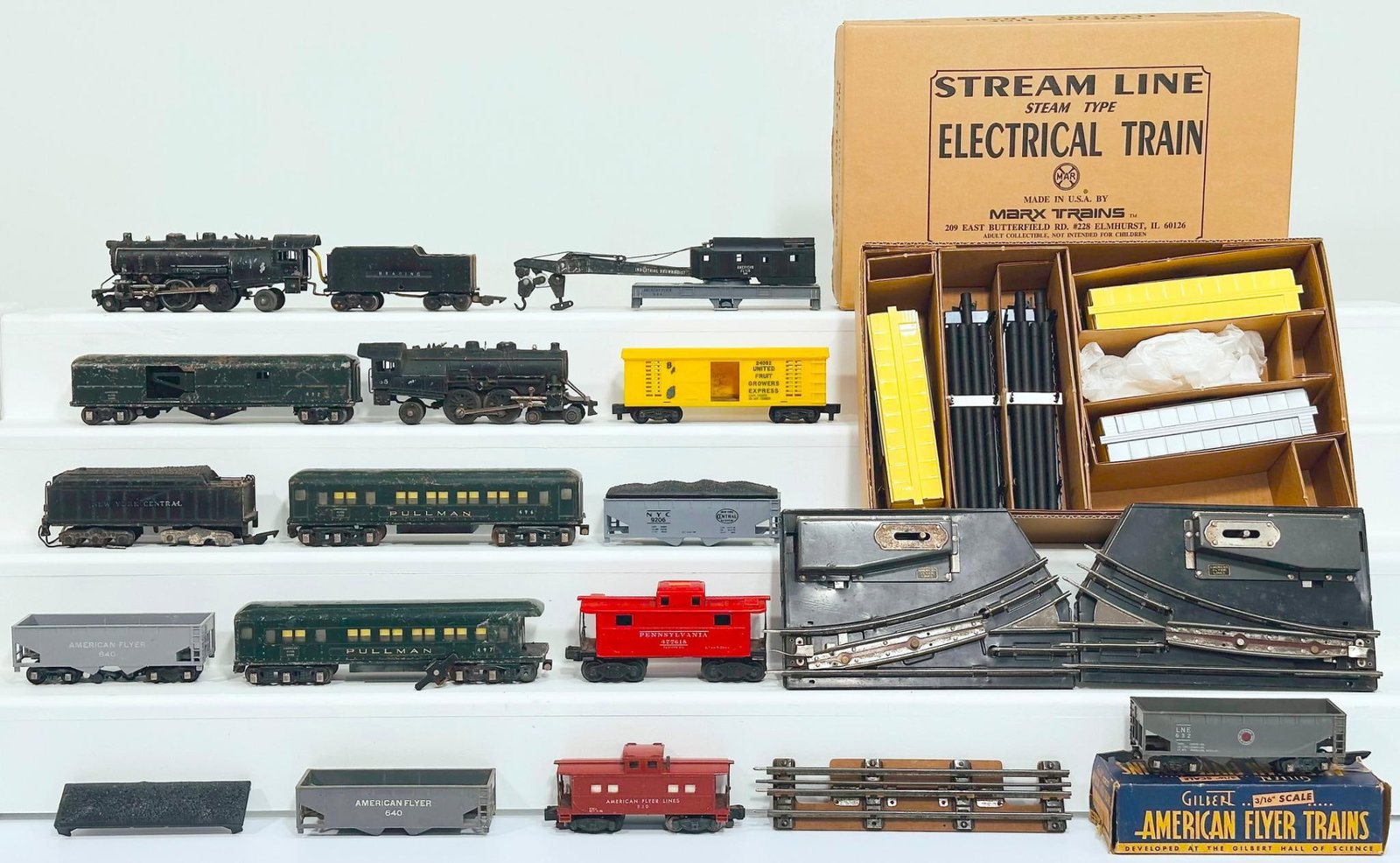 American Flyer Postwar S Gauge Assorted Locomotives and Tenders and Passenger Cars and Freight Cars: American Flyer Postwar S Gauge Assorted Locomotives and Tenders and Passenger Cars and Freight Cars, each in C6 minus. This Lot Also includes New Marx Modern O Gauge Five (5) Assorted Freight Cars, ea