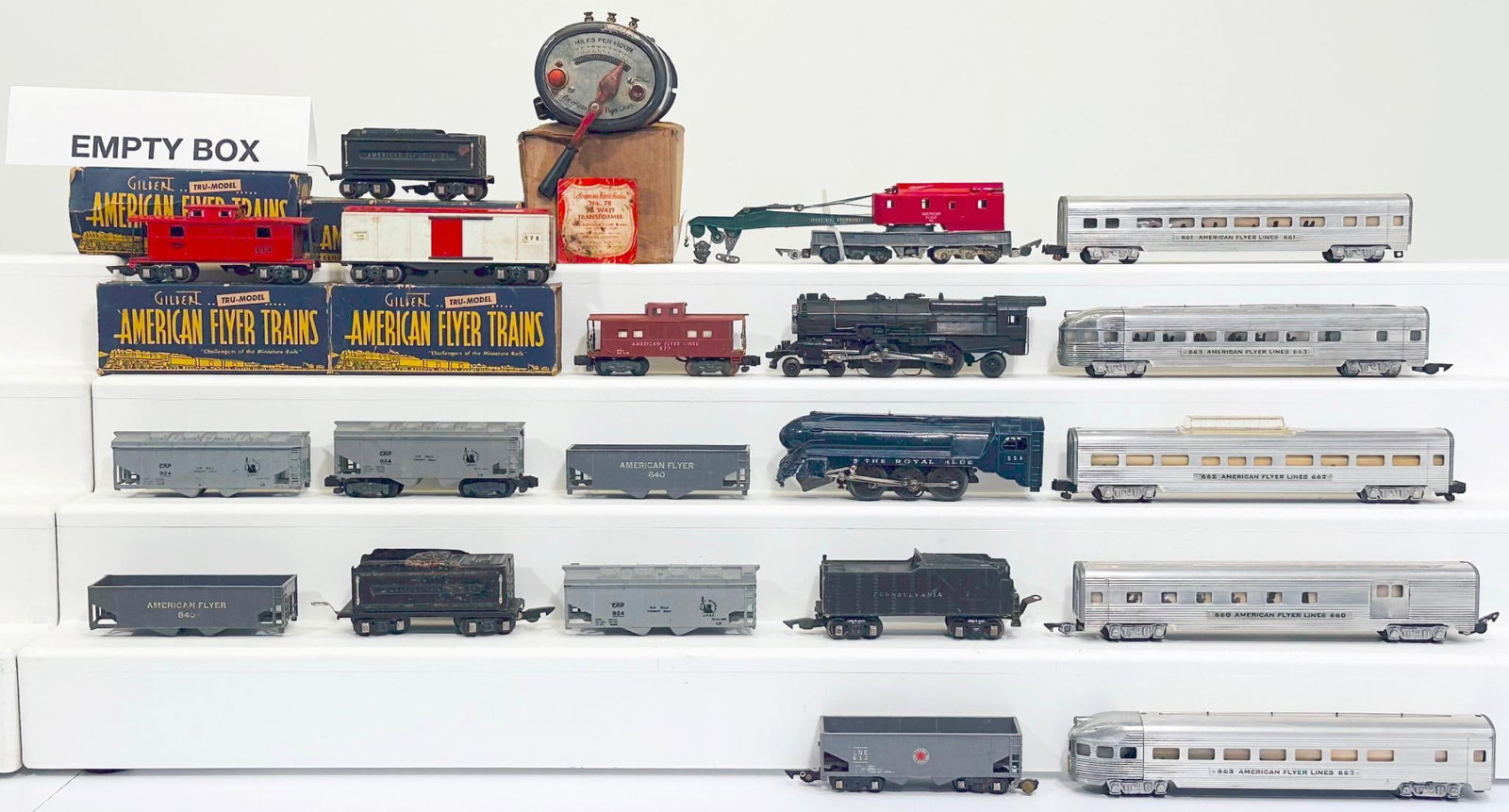American Flyer Postwar S Gauge 5 Aluminum Passenger Cars and Assorted Freight Cars/Royal Blue Loco: American Flyer Postwar S Gauge 5 Aluminum Passenger Cars and Assorted Freight Cars/Royal Blue Locomotives missing Wheels and 4 - 4 - 2 Locomotive and Tender, each in C6 or better.