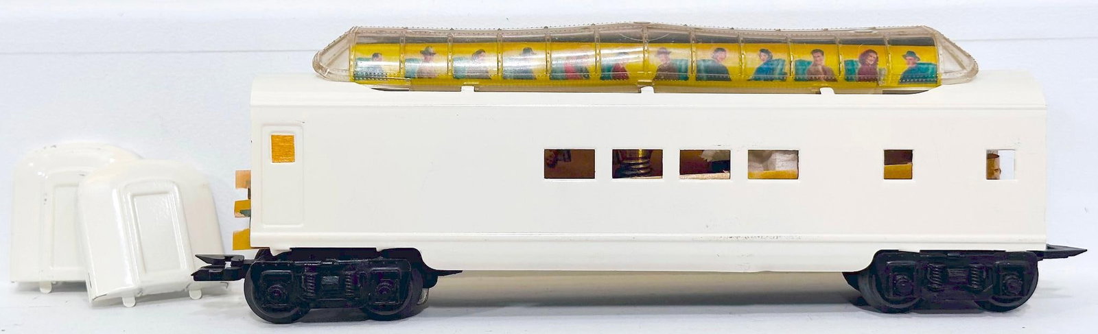 Marx Postwar O Gauge hand painted Factory Prototype hand painted all white Vista Dome Passenger Car: Marx Postwar O Gauge hand painted Factory Prototype hand painted all white Vista Dome Passenger Car, in C7. Longest item in this Lot is 11 inches.