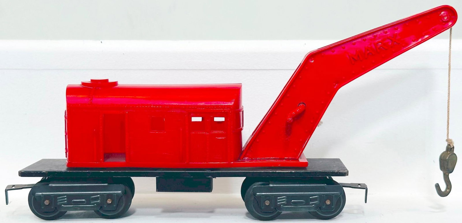 Marx Postwar O Gauge Factory Prototype plastic Crane Car: Marx Postwar O Gauge Factory Prototype plastic Crane Car, Model #1616, dated September 1, 1950, in Girard, in C7. Longest item in this Lot is 11 inches.
