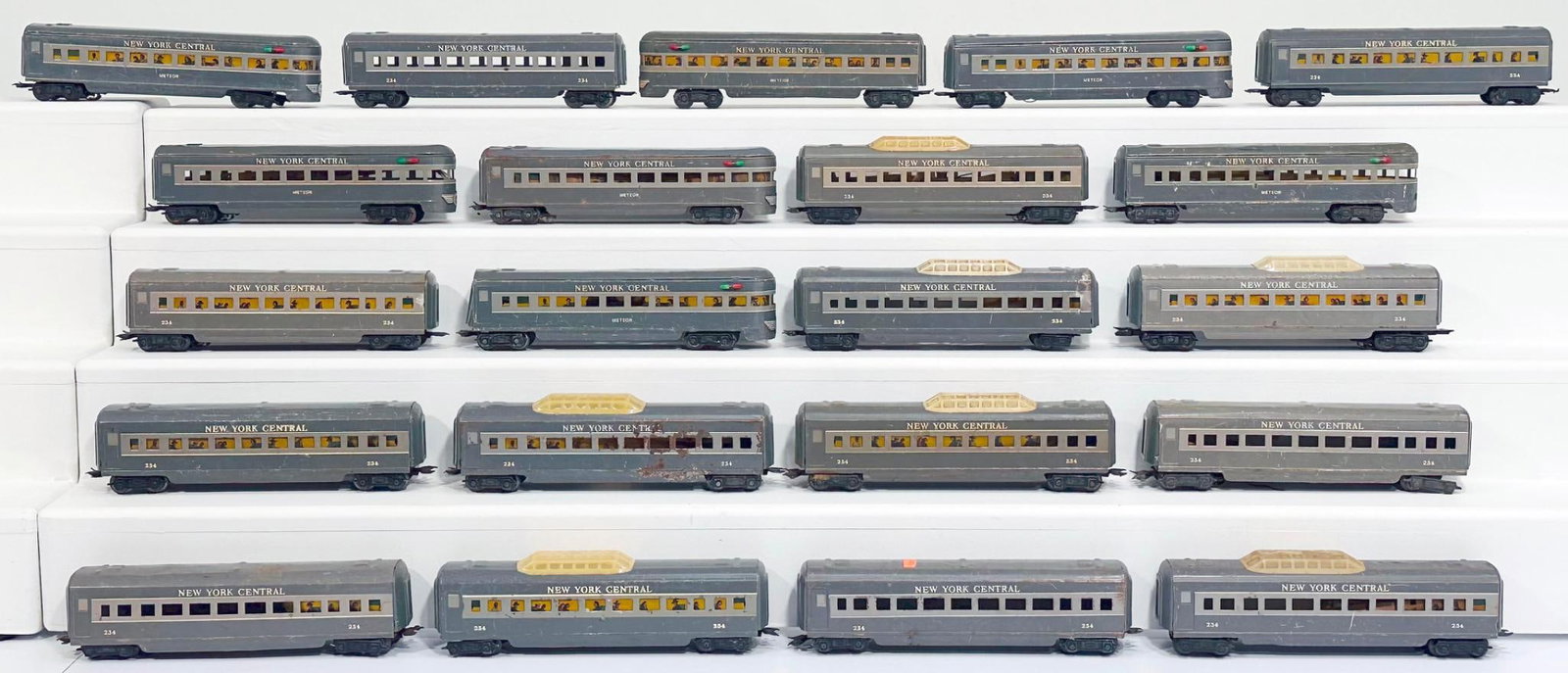 Marx Postwar O Gauge Twenty (21) Assorted New York Central Passenger Cars: Marx Postwar O Gauge Twenty (21) Assorted New York Central Passenger Cars, each in C5 to C6 minus. Longest item in this Lot is 12 inches.