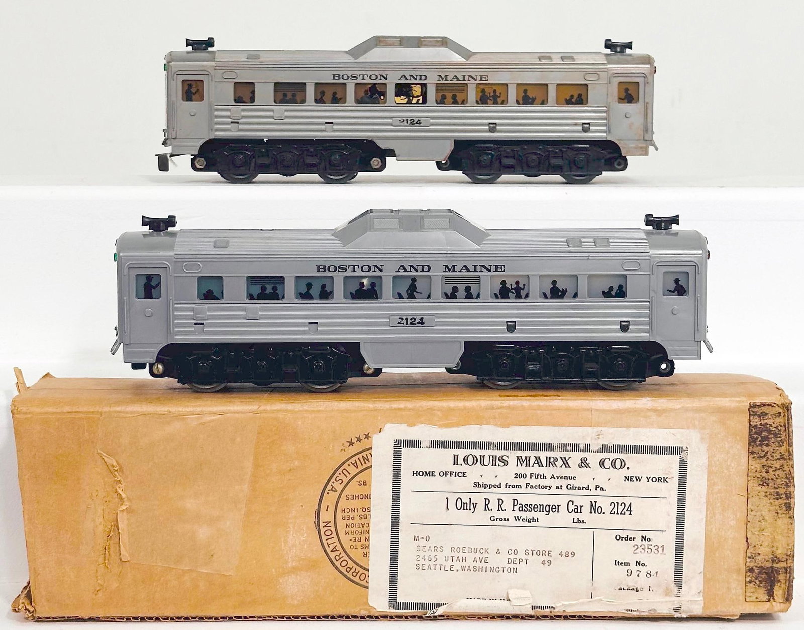 Marx Postwar O Gauge Boston and Maine Budd Power Car X2: Marx Postwar O Gauge Boston and Maine Budd Power Car X2, with one of the Budd Cars in C6, and the other Budd Car in C7 to C8 and with its original box and liners, with one end flap missing. Longest it