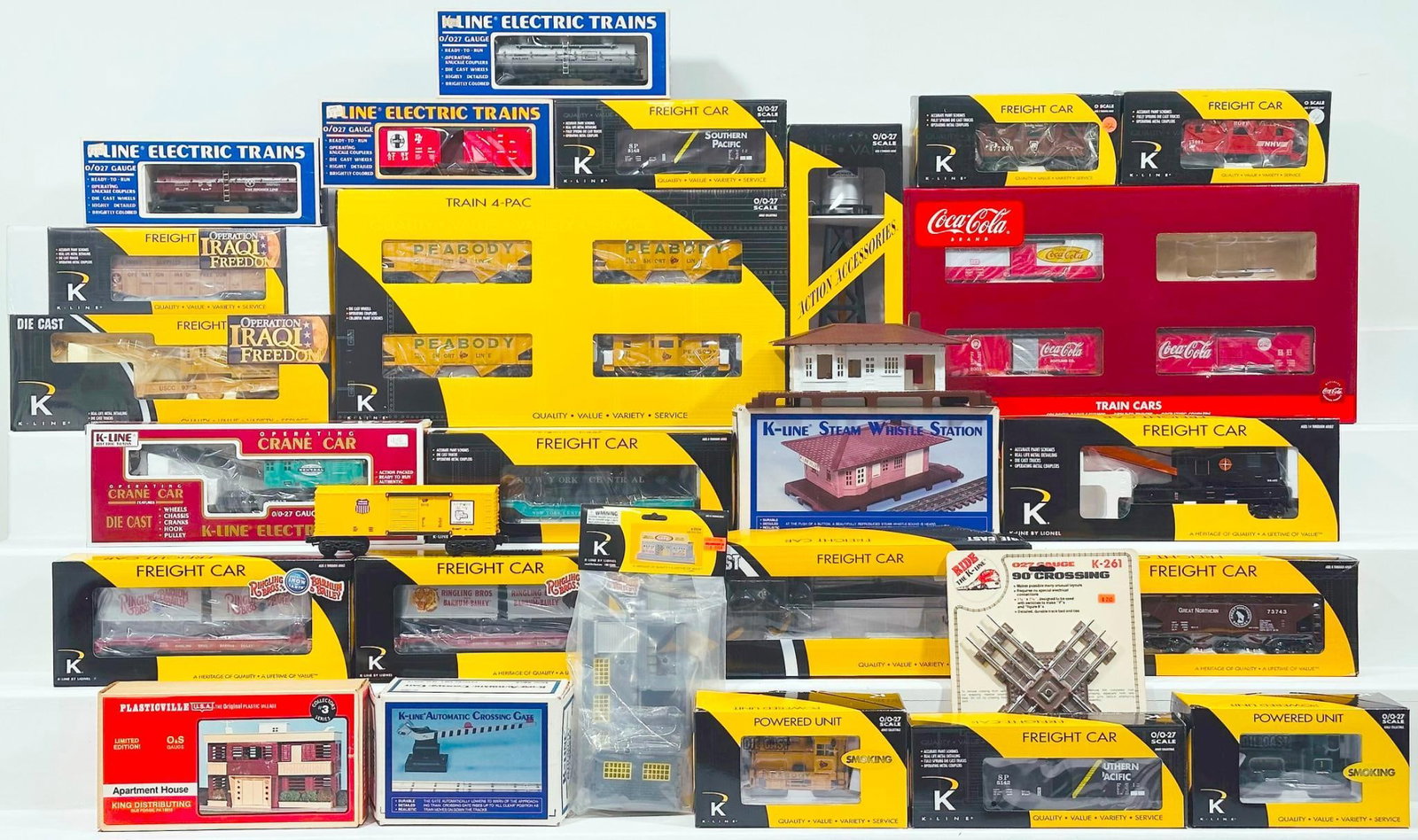K-Line Modern O Gauge Assorted Freight Cars/Switchers/Coca-Cola Box Car 4 pack/Peabody Freight Cars: K-Line Modern O Gauge Assorted Freight Cars/ Switchers/Coca-Cola Box Car 4 pack/Peabody Freight Car 4 pack Boxed, each in C8 or better and each with its original box. Longest item in this Lot is 23 in