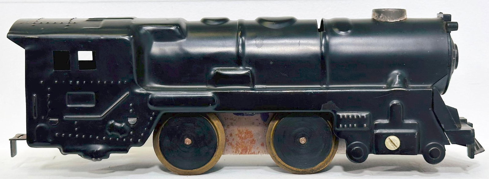 Marx Postwar O Gauge 0 - 4 - 0 Factory Prototype Locomotive: Marx Postwar O Gauge 0 - 4 - 0 Factory Prototype Locomotive, Model #2340, dated November 2, 1956, in Girard, PA, in C7. Longest item in this Lot is 10 inches.