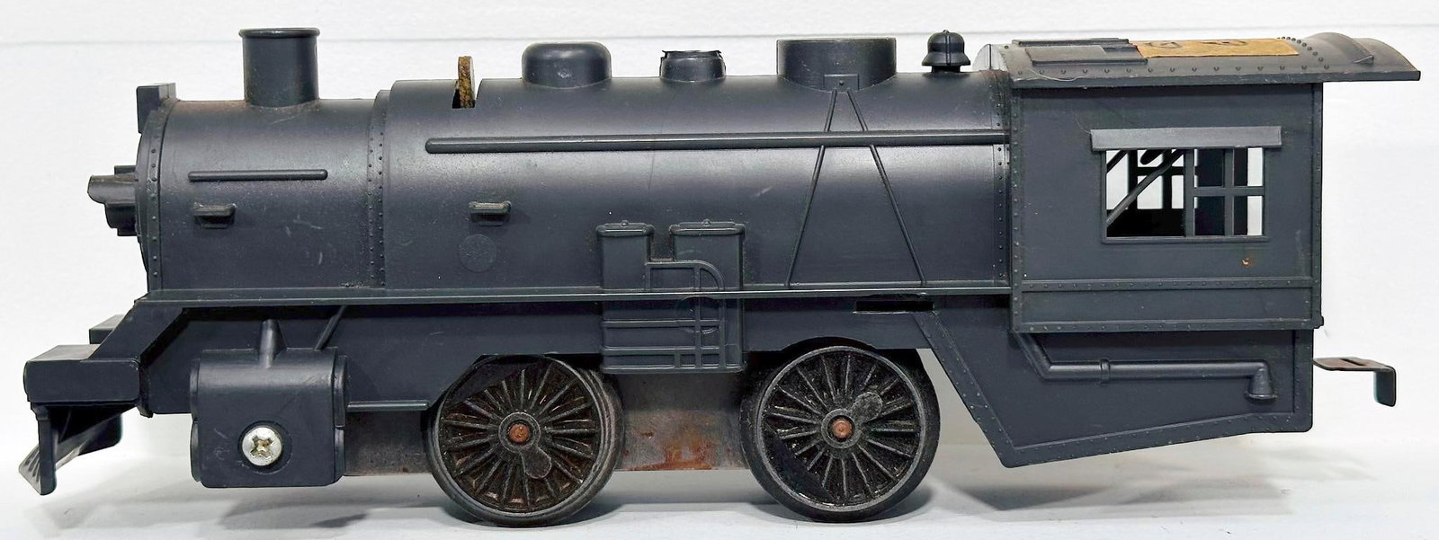 Marx Postwar O Gauge Factory Prototype 0 - 4 - 0 gray plastic Locomotive: Marx Postwar O Gauge Factory Prototype 0 - 4 - 0 gray plastic Locomotive, #G00D, dated June 27, 1973, in C7.