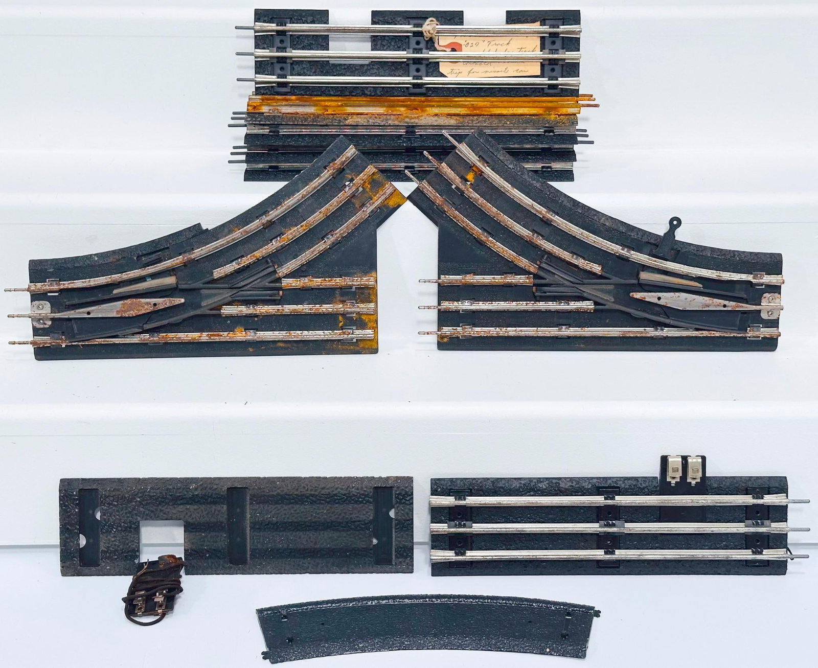 Marx Postwar O Gauge Factory Prototype Ten (10) Sections of Track with Roadbed: Marx Postwar O Gauge Factory Prototype Ten (10) Sections of Track with Roadbed, Model #2646 - A, dated July 28, 1960, in Girard, PA, in C6 or better with some rust on sections. Other Factory Prototype