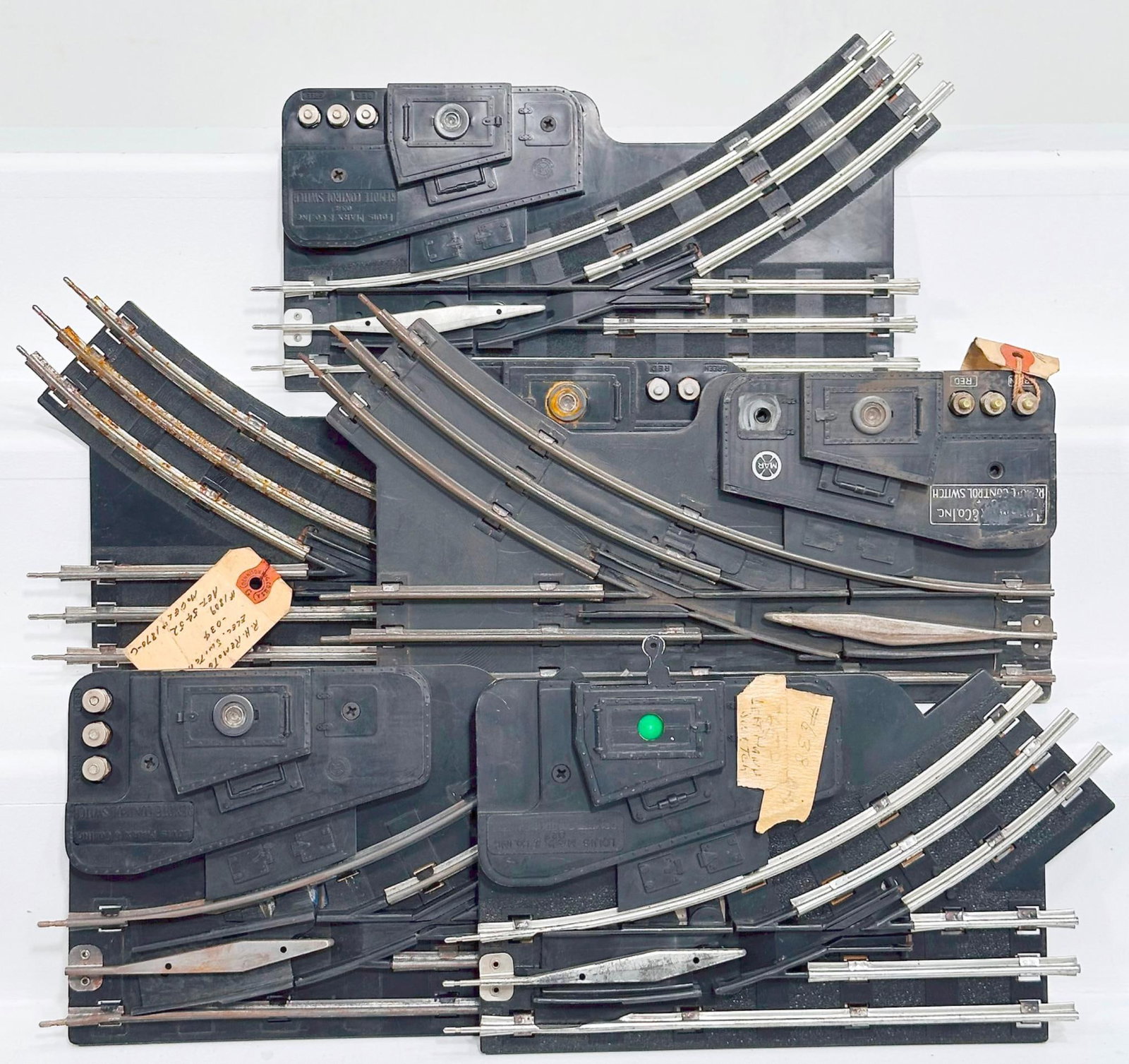 Marx Postwar Factory Archive Remote Control Electric Switches 034: Marx Postwar Factory Archive Remote Control Electric Switches 034, Factory Archive #1809, AET - 5452, in C6 because rust. There are five (5) Switch Sections with this Lot. This Lot also includes a Lef