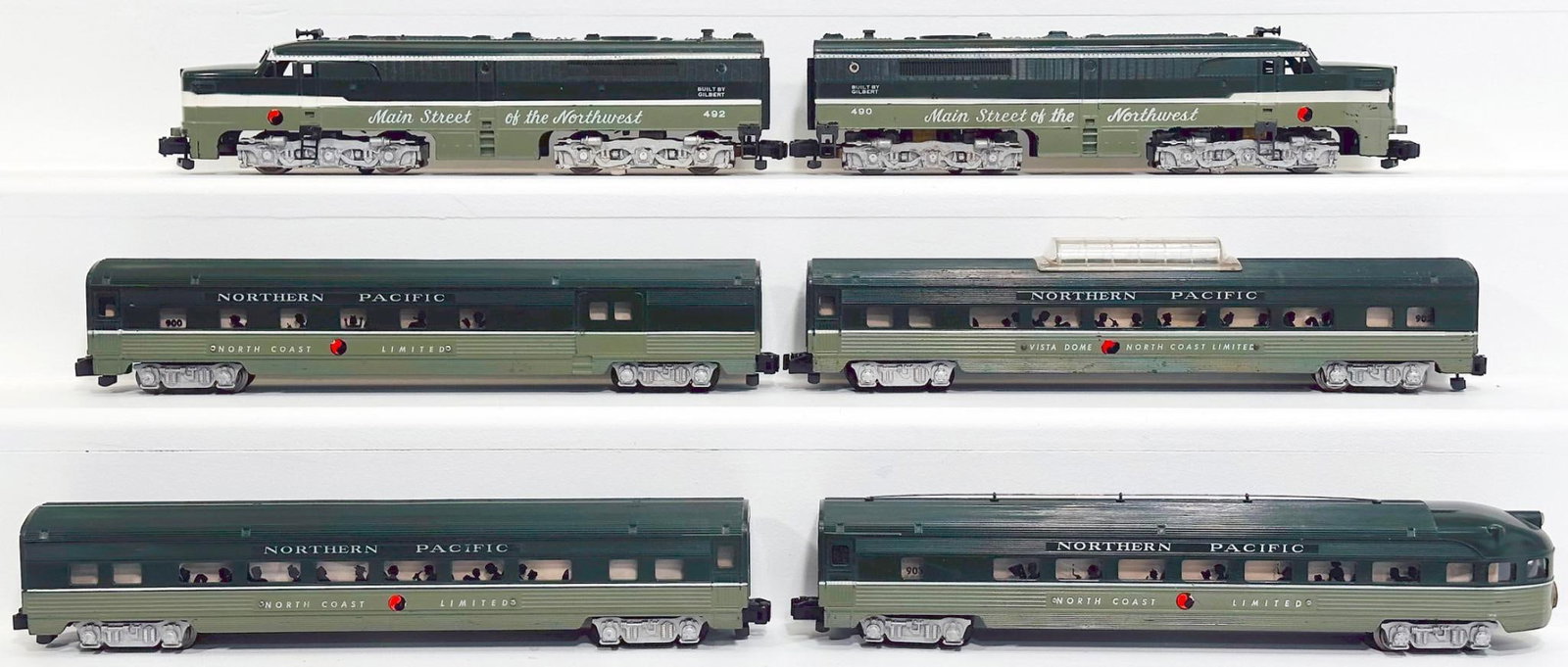 American Flyer Postwar S Gauge Northern Pacific Passenger Set 490 - 492: American Flyer Postwar S Gauge Northern Pacific Passenger Set 490 - 492, each in C7. This Lot also includes four (4) Norther Pacific Passenger Cars, each in C7. Longest item in this Lot is 14 inches.