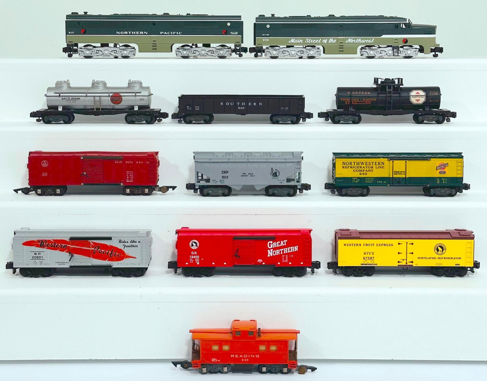 Lionel American Flyer Modern S Gauge Northern Pacific A-B Alco Diesel Units/Three (3) Assorted Cars: Lionel American Flyer Modern S Gauge Northern Pacific A - B Alco Diesel Units and Three (3) Assorted Freight Cars and American Flyer Postwar S Gauge Seven (7) Freight Cars, with the Northern Pacific A