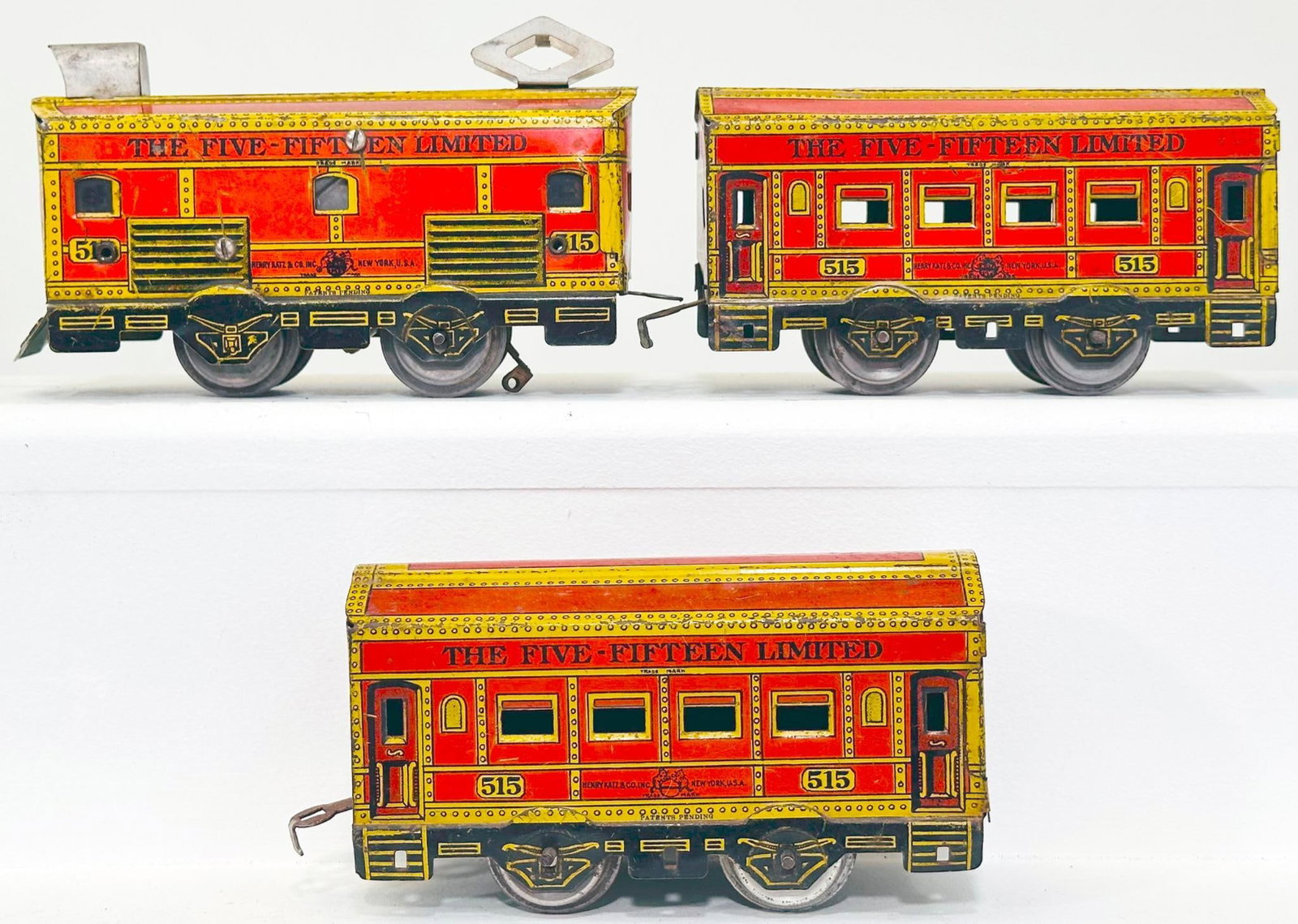 Katz Co. Prewar O Gauge 515 Limited Passenger Set with Litho Electrictype Locomotive: Katz Co. Prewar O Gauge 515 Limited Passenger Set, with Litho Electrictype Locomotive with electric motor with two (2) 4 Wheel Matching Passenger Cars, graphics are "The 515 Limited" and this is the l