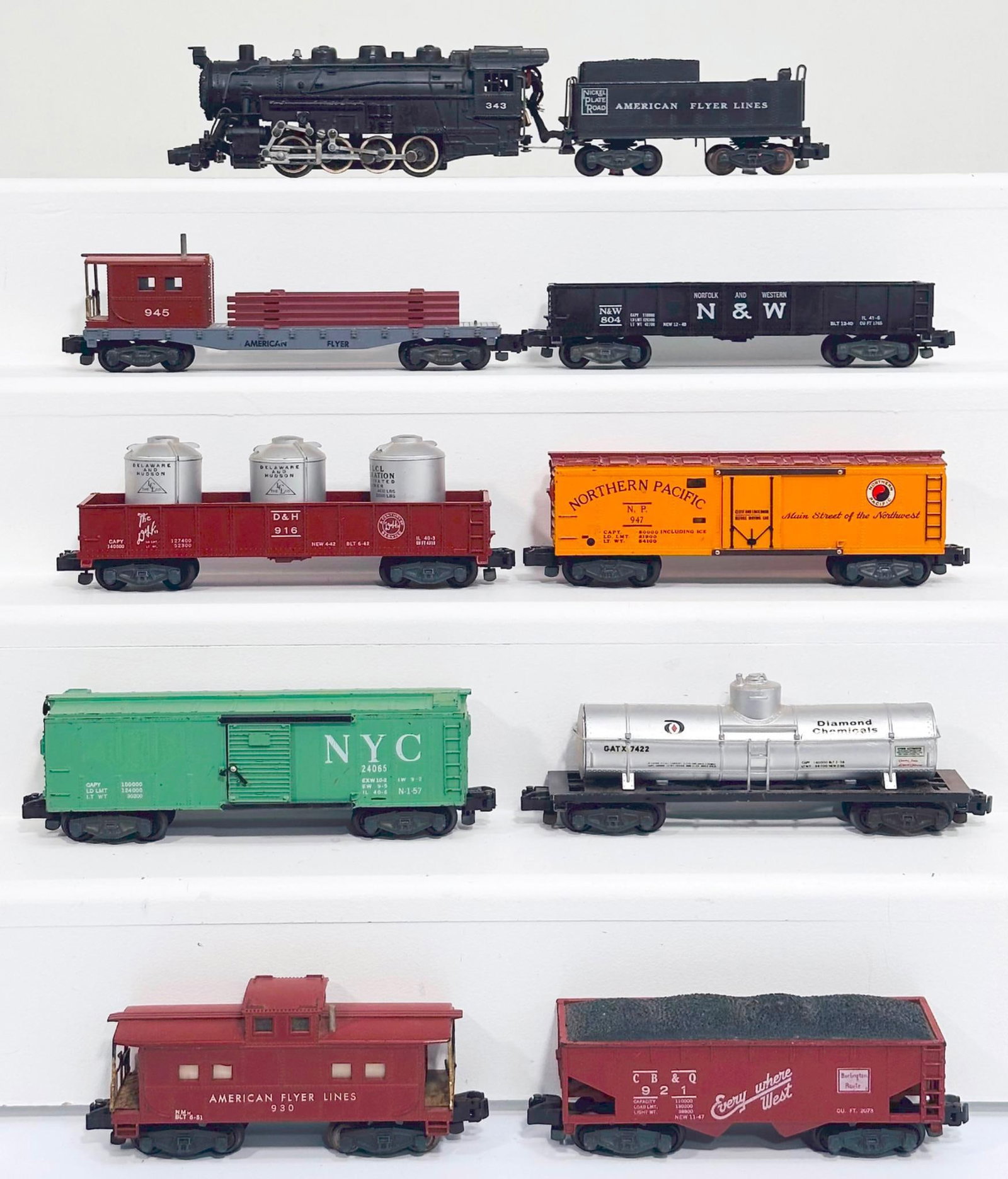 American Flyer Postwar S Gauge 343 Nickel Plate Road 0 - 8 - 0 Locomotive and Tender/Eight (8) Cars: American Flyer Postwar S Gauge 343 Nickel Plate Road 0 - 8 - 0 Locomotive and Tender and Eight (8) Assorted Freight Cars, with the 343 Locomotive and Tender, each in C7, and including 947 in C7 plus,
