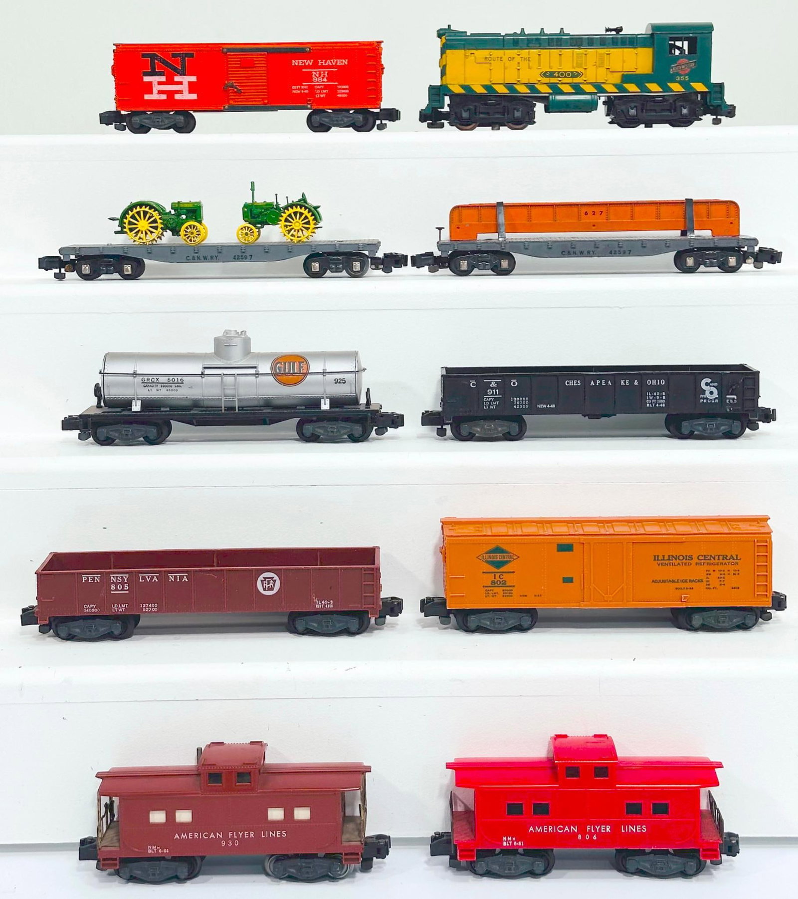 American Flyer Postwar S Gauge Northwestern 355 Switcher and Nine (9) Assorted Freight Cars: American Flyer Postwar S Gauge Northwestern 355 Switcher and Nine (9) Assorted Freight Cars, including 355 in C7, and including 802 in C7, 984 in C7 minus, 42597 in C7 with diecast tractor load X2,