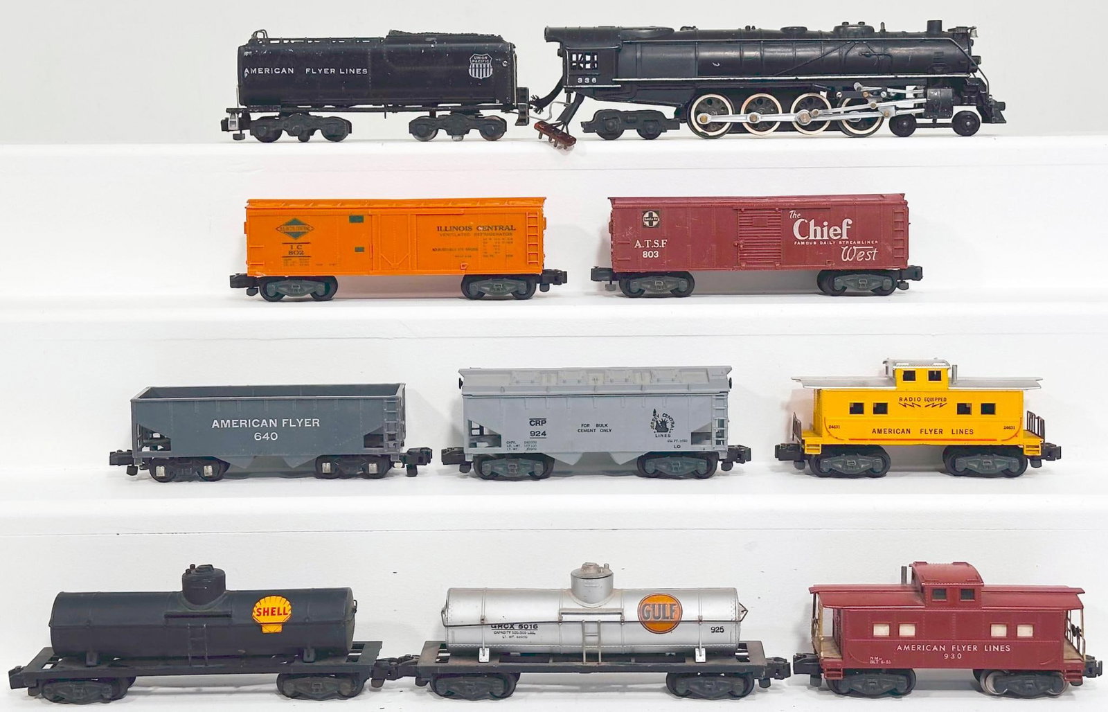 American Flyer Postwar S Gauge 336 Union Pacific 4 - 8 - 4 Locomotive and Tender and Eight (8) Cars: American Flyer Postwar S Gauge 336 Union Pacific 4 - 8 - 4 Locomotive and Tender and Eight (8) Assorted Freight Cars, with the 336 in C6 to C6 plus for the Loco and C6 for the Tender, including 802 in