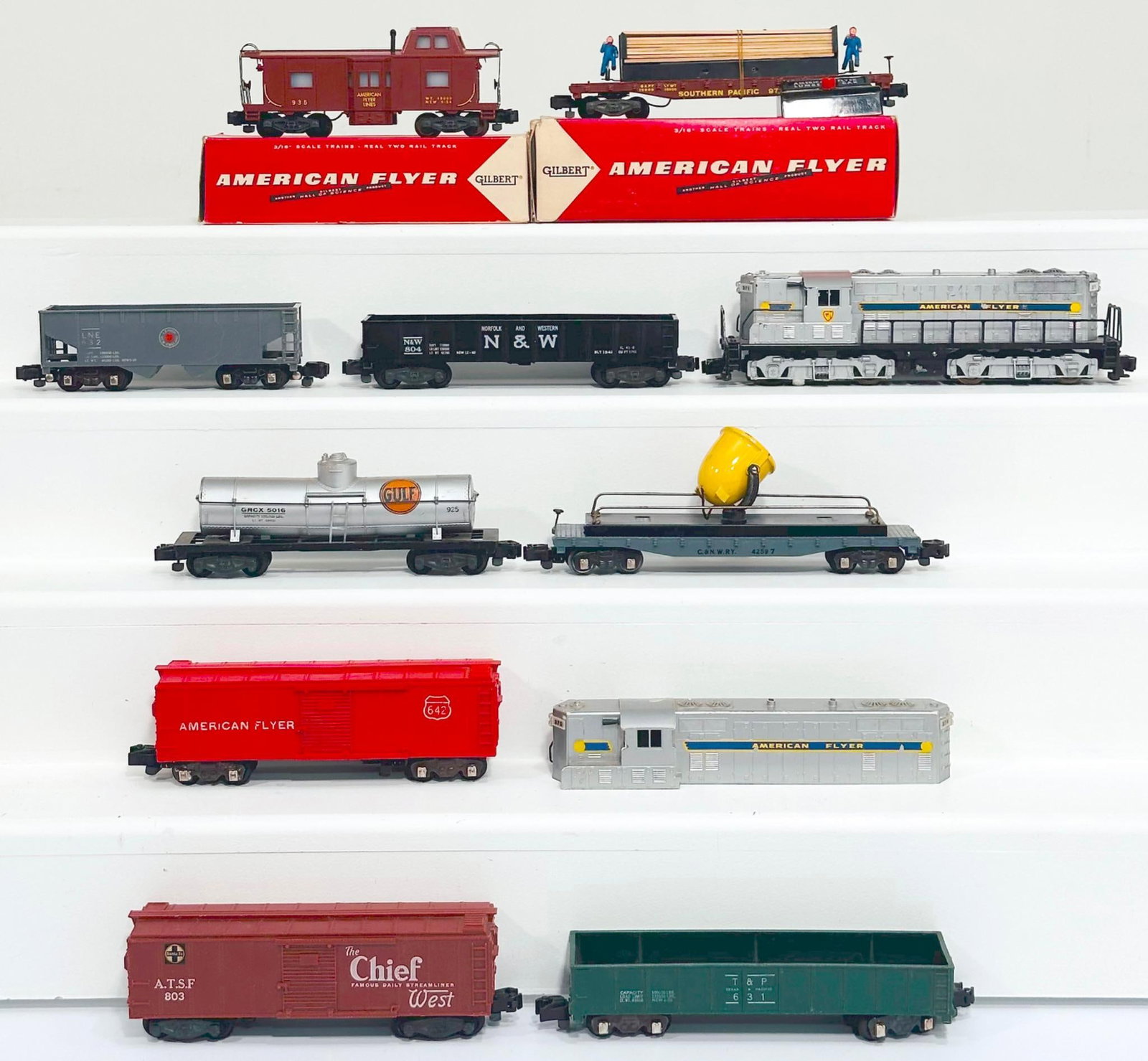 American Flyer Postwar S Gauge 371 GM Diesel and Nine (9) Assorted Freight Cars: American Flyer Postwar S Gauge 371 GM Diesel and Nine (9) Assorted Freight Cars, with the 371 in C6 plus to C7 minus, and including 24618 Deluxe Caboose in C7 and with its original box, 621 in C7, 804
