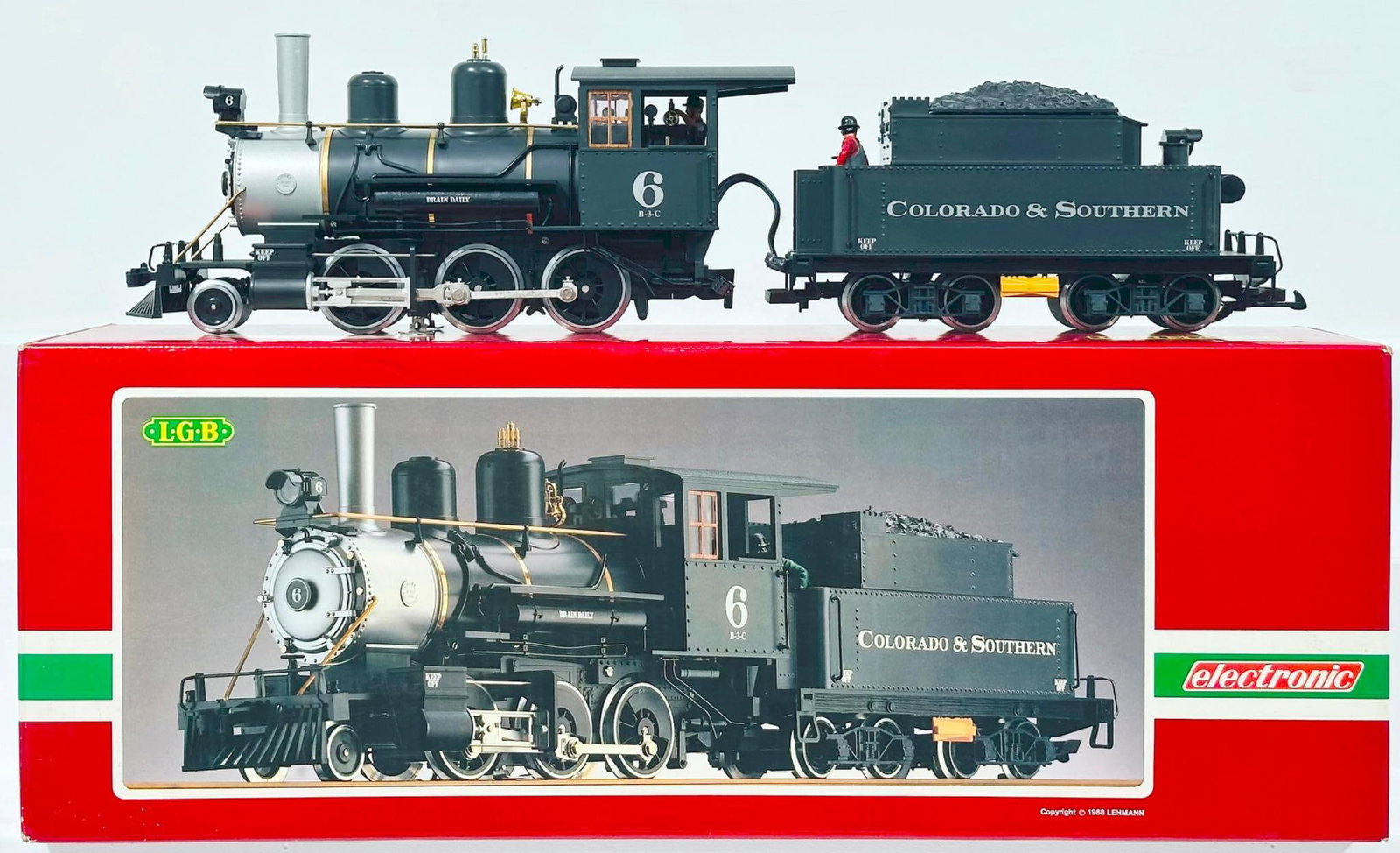 LGB Modern G Scale Colorado and Southern 2 - 6 - 0 Locomotive and Tender #20195 Boxed: LGB Modern G Scale Colorado and Southern 2 - 6 - 0 Locomotive and Tender #20195 Boxed, in C8 or better and with its original box. This is the electronic version. Longest item in this Lot is 30 inches.