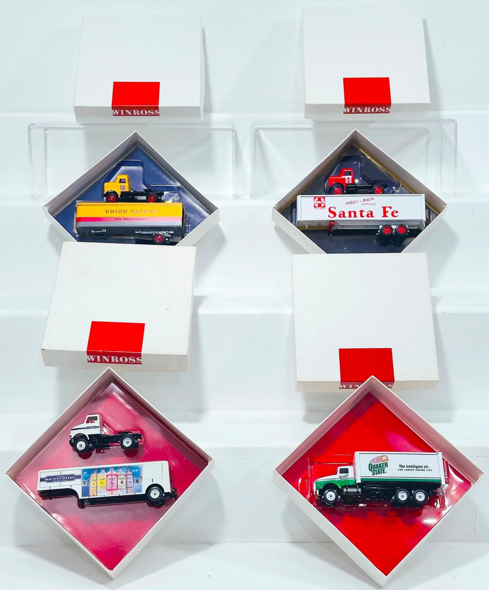 Winross Modern Diecast Truck X4 Boxed: Winross Modern Diecast Truck X4 Boxed, each in C8 or better and each with its original box. Longest item in this Lot is 8 inches.
