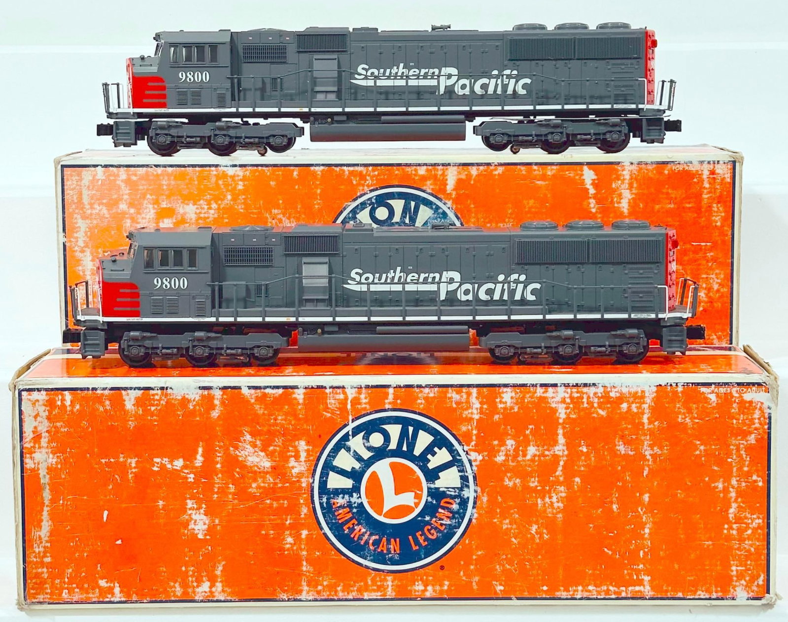 Lionel Modern O Gauge SD 60/70 Southern Pacific Diesel Switcher X2 Boxed: Lionel Modern O Gauge SD 60/70 Southern Pacific Diesel Switcher X2 Boxed, each in C8 or better and each with its original box. Each original box shows moderate to heavy wear.