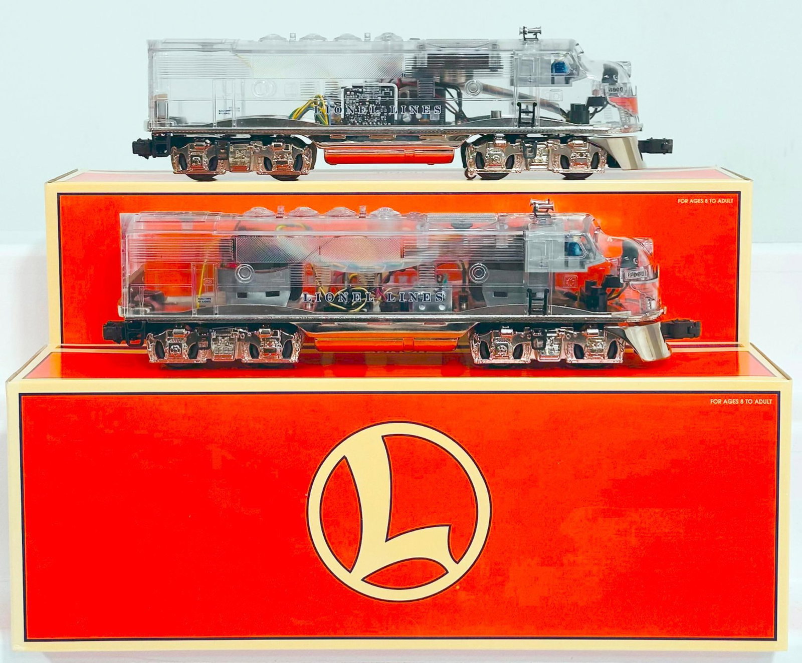 Lionel Modern O Gauge F3 A Powered Clear Cab and F-3 A Nonpowered Clear Cab Boxed: Lionel Modern O Gauge F3 A Powered Clear Cab and F-3 A Nonpowered Clear Cab Boxed, each in C8 or better and each with its original box.