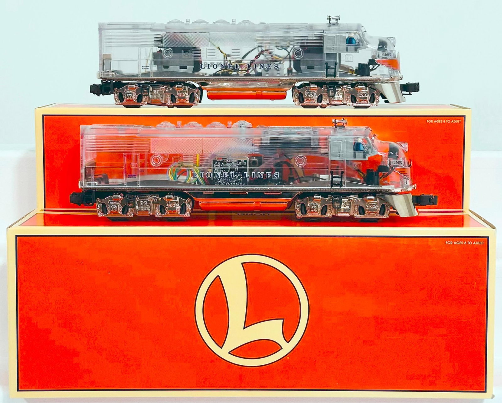 Lionel Modern O Gauge F-3 A Powered Clear Cab and F-3 A Nonpowered Clear Cab Boxed: Lionel Modern O Gauge F-3 A Powered Clear Cab and F-3 A Nonpowered Clear Cab Boxed, each in C8 or better and each with its original box.