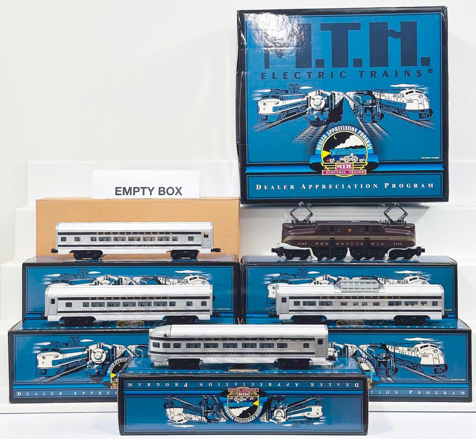 MTH Dealer Appreciation Program Modern O Gauge 2000 DAP Program Penn. GG-1 Passenger Set Boxed: MTH Dealer Appreciation Program Modern O Gauge 2000 DAP Program Pennsylvania GG-1 Passenger Set Boxed, in C8 or better and with its original set box and interior boxes.