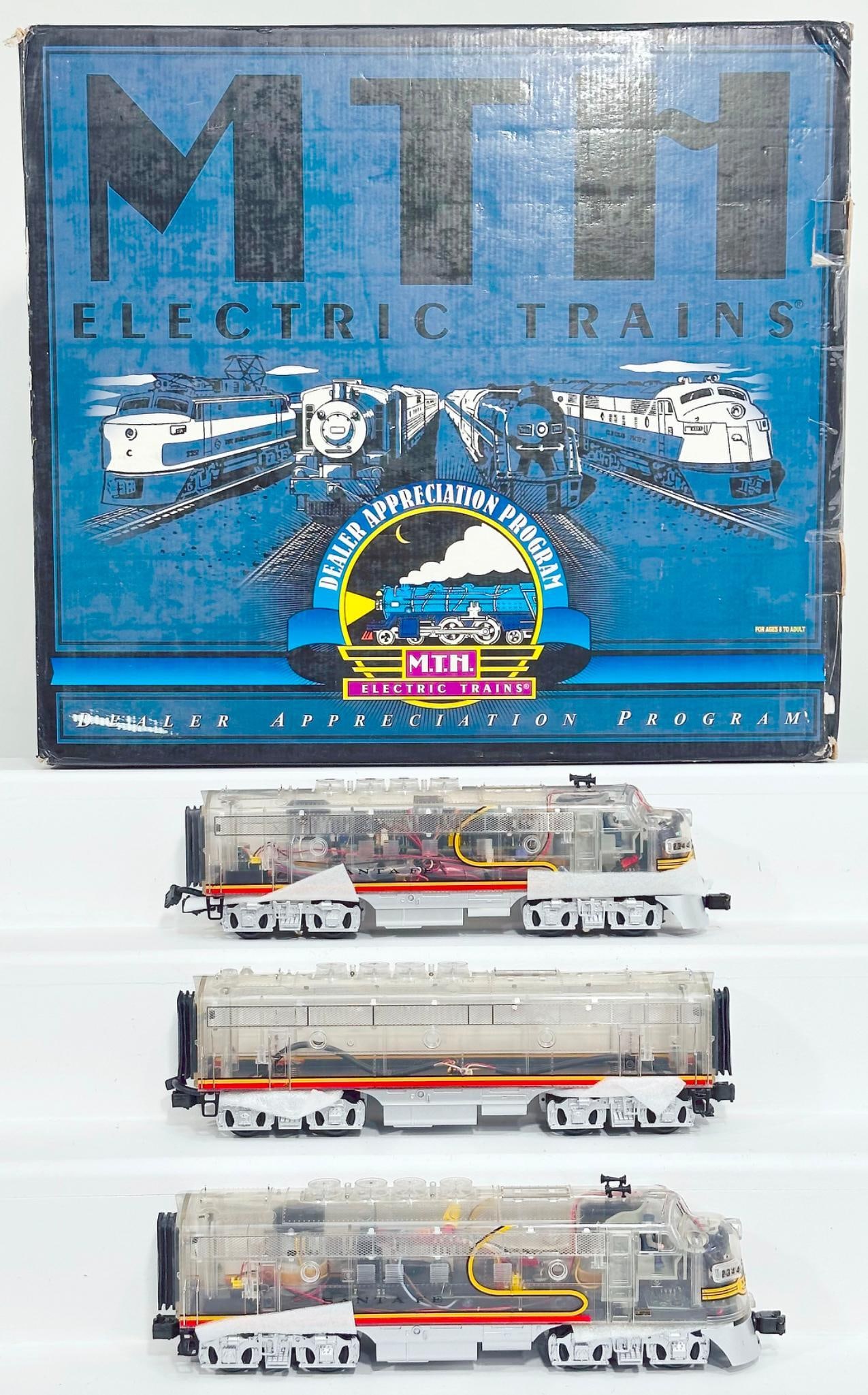 MTH Dealer Appreciation Program Modern O Gauge Santa Fe A - Clear Body F - 3 ABA Diesel Set Boxed: MTH Dealer Appreciation Program Modern O Gauge Santa Fe A - Clear Body F - 3 ABA Diesel Set Boxed, in C8 or better and with its original box that shows light wear.