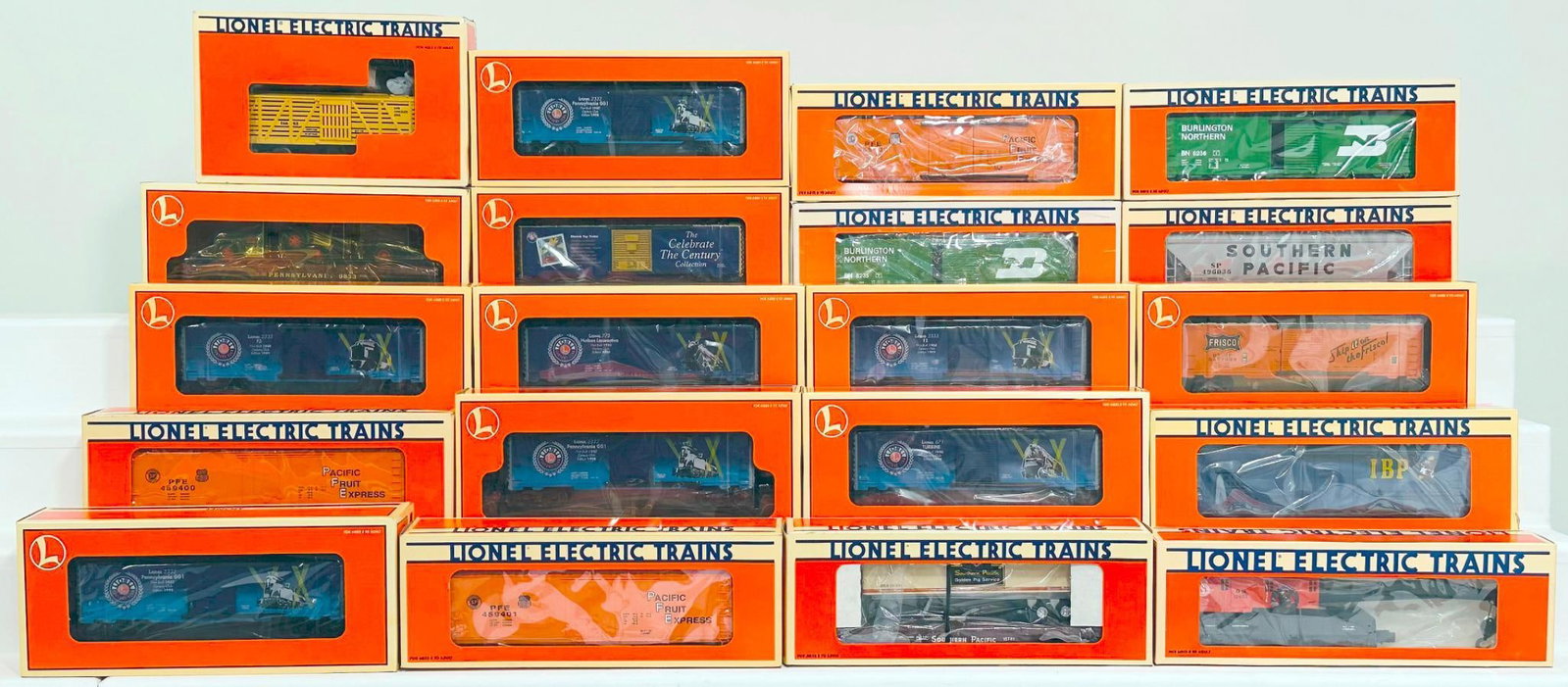 Lionel Modern O Gauge Twenty (20) Assorted Freight Cars Boxed: Lionel Modern O Gauge Twenty (20) Assorted Freight Cars Boxed, including Pacific Fruit Express Reefer, Great Northern Crane Car, 1992 TTOS Convention Car, TTOS Cal Stewart Reefer, Pacific Fruit Expres