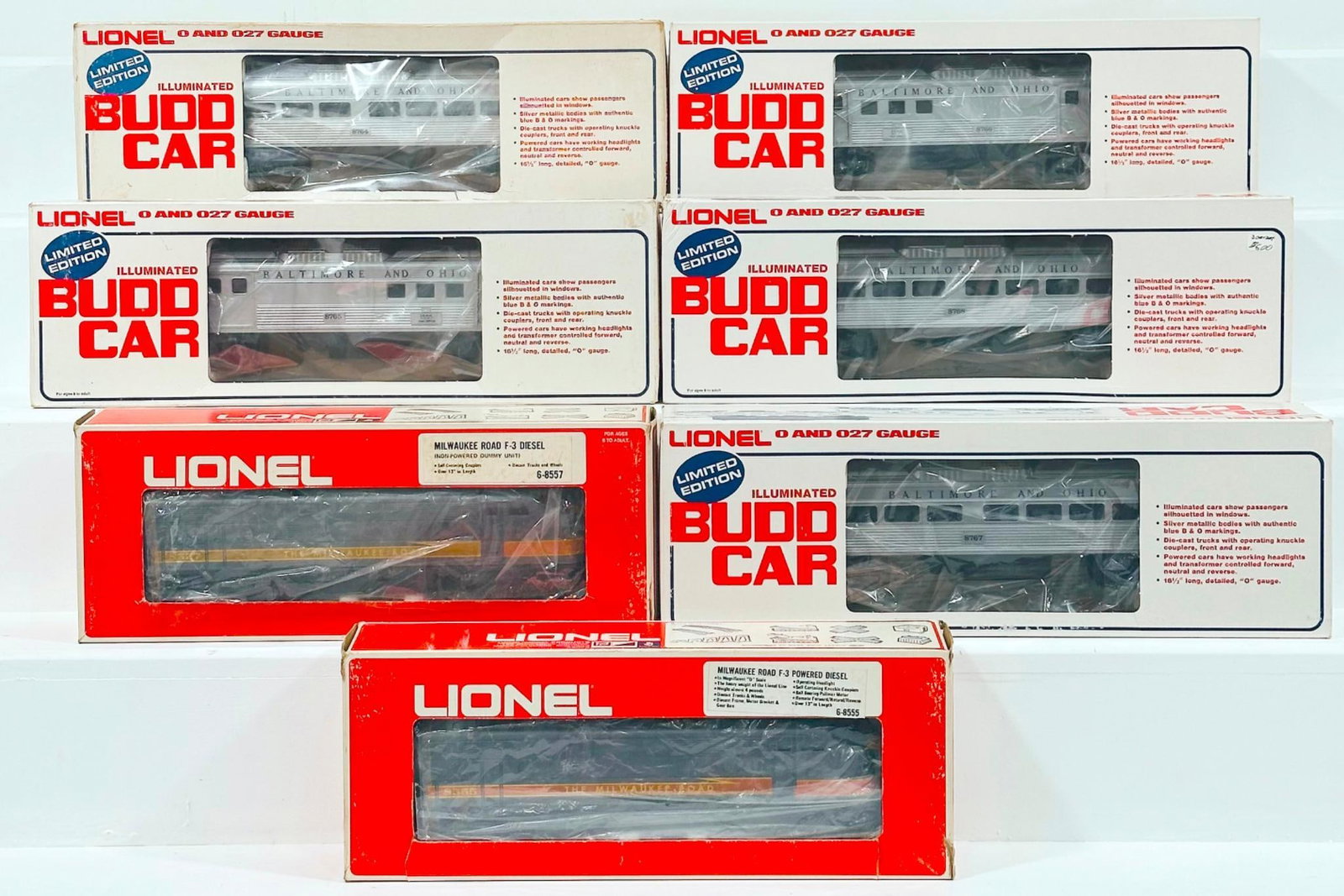Lionel Modern O Gauge Assorted Budd Passenger Cars and Milwaukee Road F-3 Diesel Dummy Unit: Lionel Modern O Gauge Budd Illuminated Commuter Train RDC-1 Passenger Car X2/Budd Illuminated Powered RDC-4 Baggage and Mail Car/Budd Powered Passenger Car/Budd Baggage Car Dummy/ Milwaukee Road F-3 D
