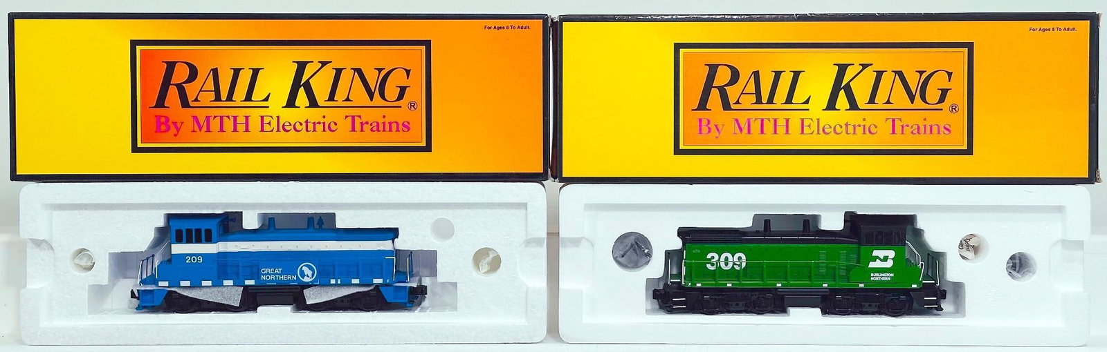MTH Rail King Modern O Gauge Burlington Northern SW-1500 Switcher Diesel Engine with PS 2.0: MTH Rail King Modern O Gauge Burlington Northern SW - 1500 Switcher Diesel Engine with PS 2.0 and Great Northern SW - 1500 Nonpowered Switcher Boxed, each in C9 and each with its original box.