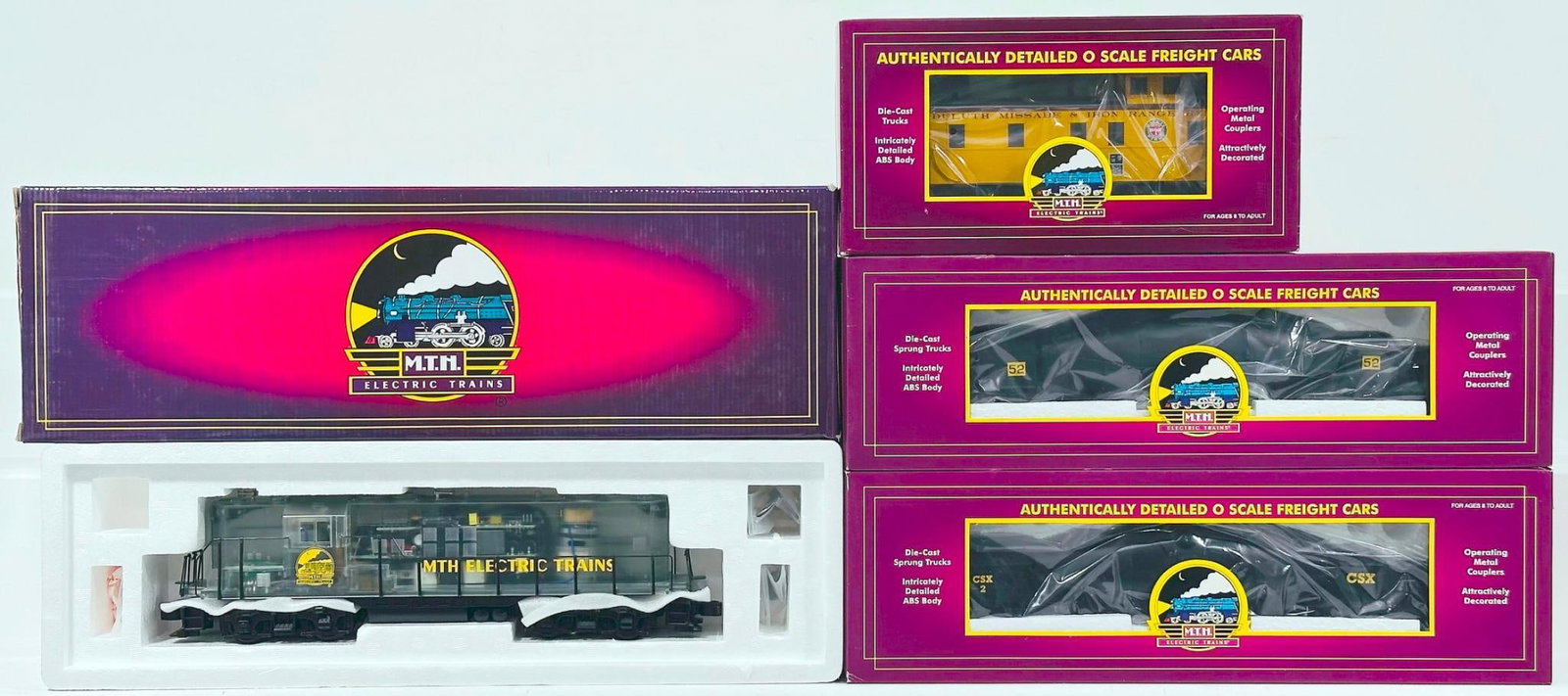 MTH Modern O Gauge Clear Body EMD GP-9 Diesel Switcher with PS 1.0 and DMIR Steel Caboose: MTH Modern O Gauge Clear Body EMD GP - 9 Diesel Switcher with PS 1.0 and DMIR Steel Caboose/Black Hot Metal Car/CSX Hot Metal Car Boxed, each in C9 and each with its original box.