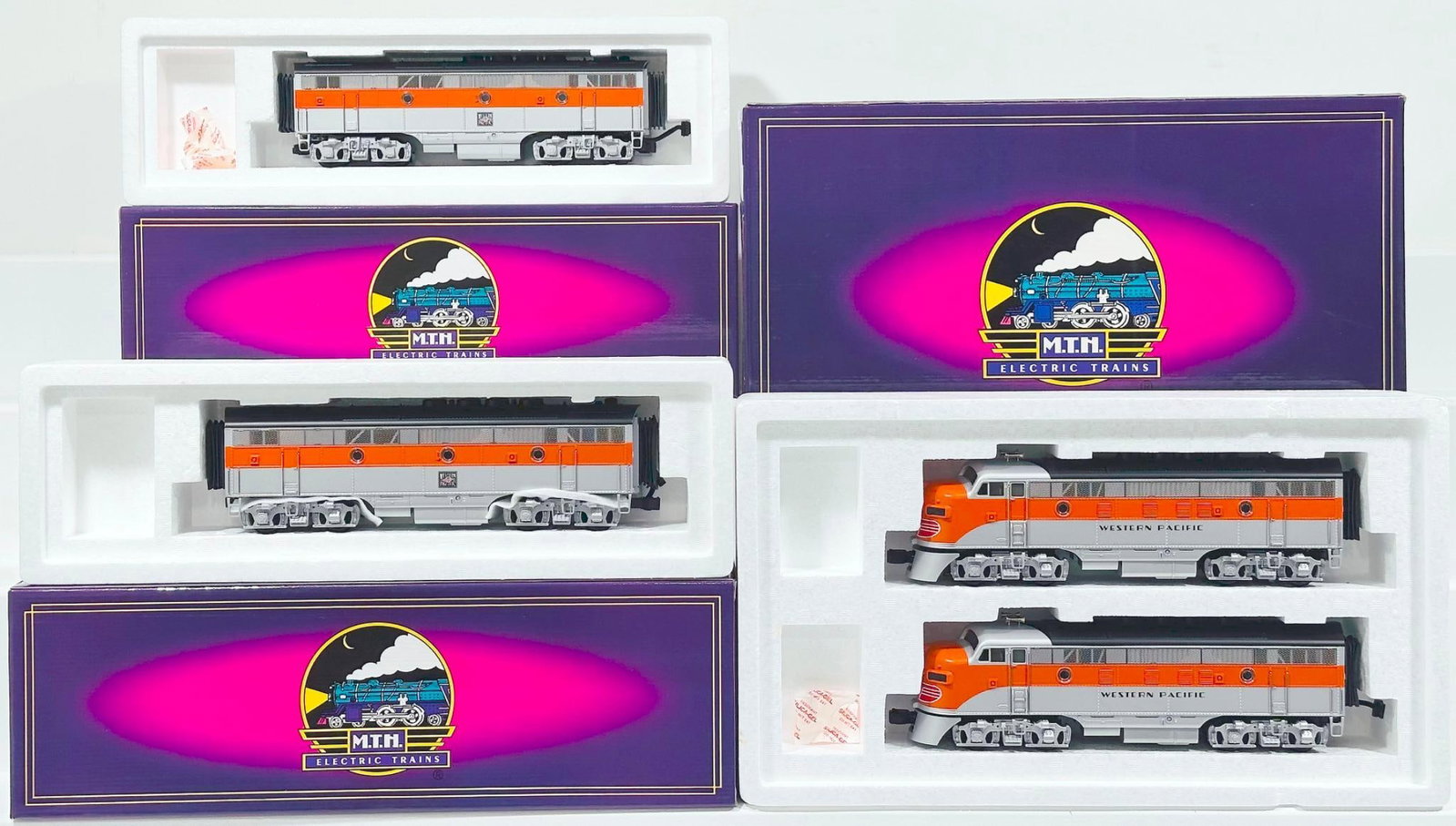 MTH Modern O Gauge Western Pacific EMD F - 3 A - A Diesel Set with PS 1.0 Boxed: MTH Modern O Gauge Western Pacific EMD F - 3 A - A Diesel Set with PS 1.0 Boxed and Western Pacific EMD F - 3 B - Unit Diesel Unit X2 Boxed, each in C9 and each with its original box.