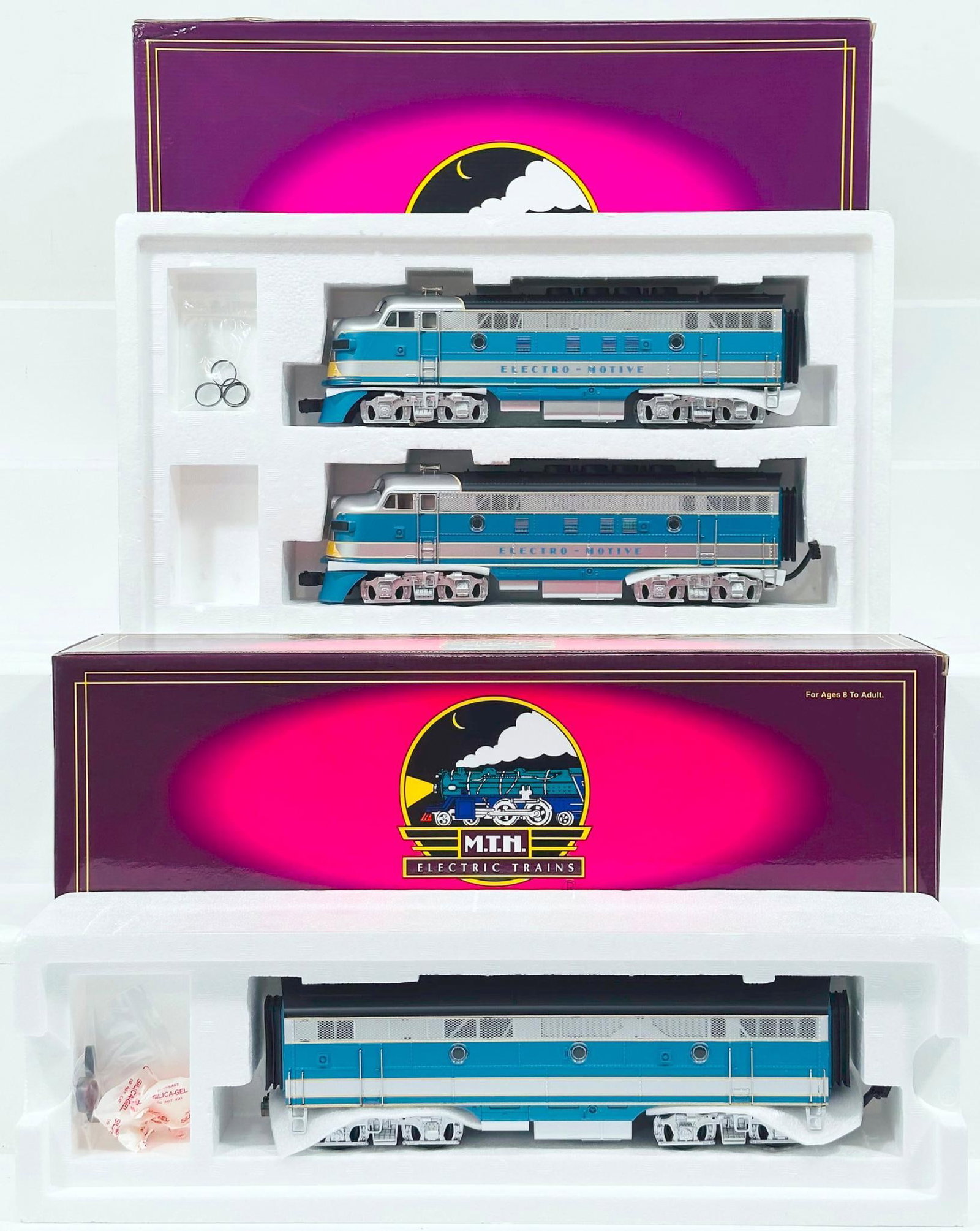 MTH Modern O Gauge ElectroMotive EMD F-3 A-A Diesel Set with PS 1.0 Boxed/ElectroMotive Division: MTH Modern O Gauge ElectroMotive EMD F - 3 A - A Diesel Set with PS 1.0 Boxed and ElectroMotive Division EMD Powered F - 3 B Diesel Unit with PS 1.0 Boxed, each in C9 and each with its original box.
