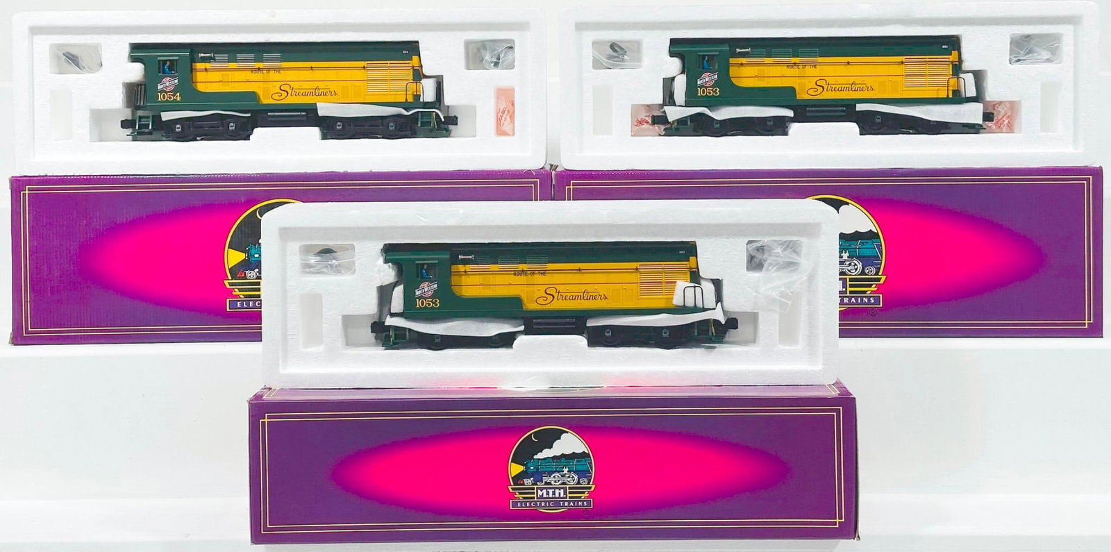 MTH Modern O Gauge Chesapeake Northwestern Fairbanks Morse H10-44 Diesel Switcher with PS 1.0 Boxed: MTH Modern O Gauge Chesapeake Northwestern Fairbanks Morse H10 - 44 Diesel Switcher with PS 1.0 Boxed X3, each in C9 and each with its original box.
