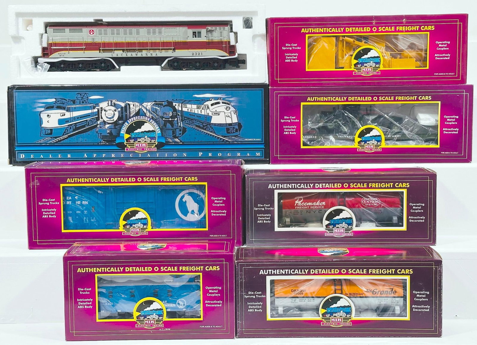 MTH Dealer Appreciation Program Modern O Gauge Lackawanna FM Trainmaster Diesel Engine with PS 1.0: MTH Dealer Appreciation Program Modern O Gauge Lackawanna FM Trainmaster Diesel Engine with PS 1.0 Boxed and Six (6) Assorted Freight Cars Boxed, with the Lackawanna FM Trainmaster, in C9 and with its