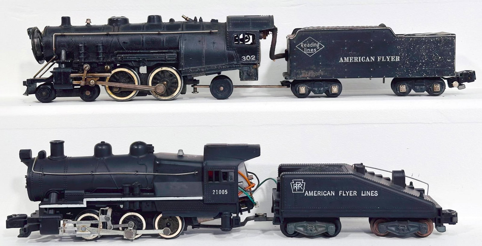 American Flyer Postwar S Gauge 21005 PRR Switcher Locomotive and Tender and 302 Reading Lines: American Flyer Postwar S Gauge 21005 PRR Switcher Locomotive and Tender and 302 Reading Lines Locomotive and Tender, with the 21005 in C7 plus and the 302 in C6.